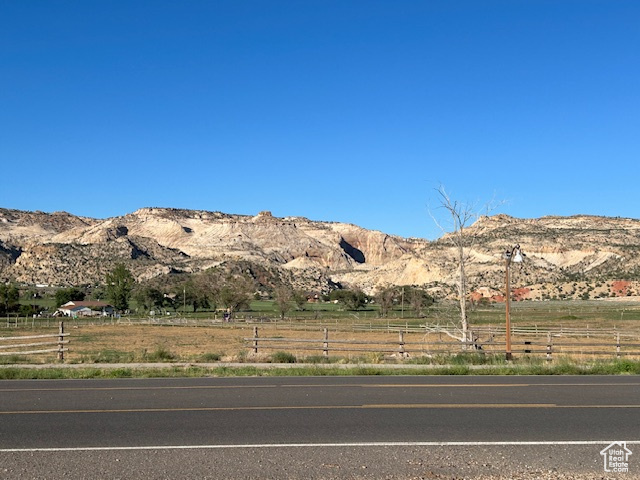 GREAT LOCATION! Large Commercial Parcel with Incredible Views of the Escalante Canyons.  Over 3+ Acres of flat & usable land on the East end of Main St. (Scenic Byway 12), situated in Escalante between Bryce Canyon and Capitol Reef.  Perfect for just about any type of Hospitality, Retail, Restaurant, Recreation rentals, etc. (with approval of Escalante City)  Located near the Clinic, Schools and New Businesses.   Utilities nearby with lots of Frontage.  Buyer to work with UDOT for approval access. Within minutes of the Escalante River Trail Head and Hole in the Rock Road.  Recreation of every kind is at your fingertips! Access to canyons, mountains and everything in between. Don't miss out on this rare Commercial Property in a growing, popular resort town.