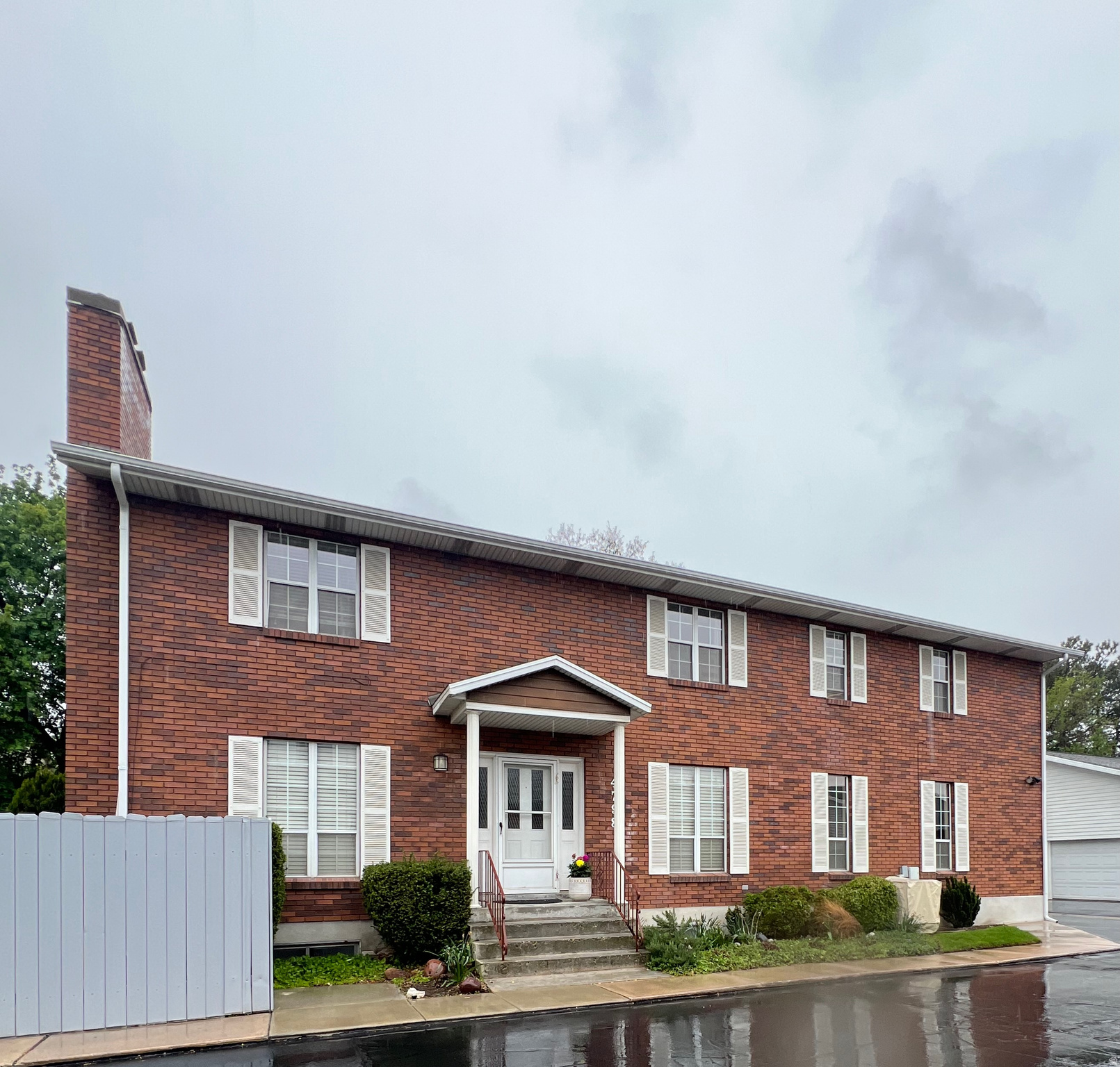 GREAT PRICE!  THE $550 HOA FEE INCLUDES EARTHQUAKE INSURANCE AS WELL AS ALL THE OTHER WONDERFUL AMENITIES* THIS IS A BONUS THAT A LOT OF OTHER HOA DO NOT INCLUDE*Great townhome nestled in the heart of Holladay. Located in the Tidewater Village Community. Many upgraded features. Dining area off the kitchen and living room with a gas fireplace and sitting area. Hardwood floors and neutral color paint. 2nd floor with three large bedrooms. Large master suite with master bathroom. Fully finished basement set up for a mother in law apt. Built in kitchen bar including a sink and small cooktop. Studio set up with a dining area, family room and bedroom.  Including a 3/4 bath. Oversized Large 2 car garage with storage. Patio with mountain views.  Buyer to verify all information.