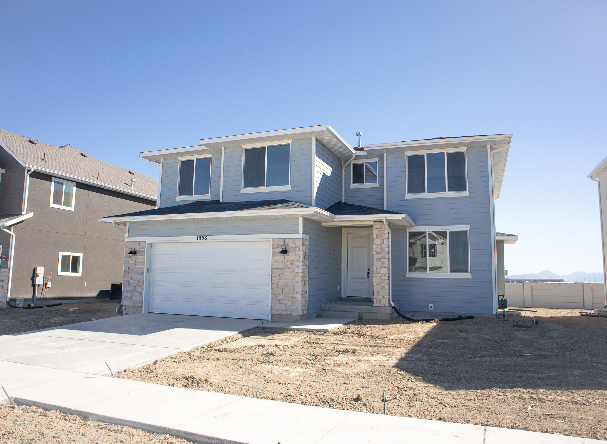 AMAZING $20,000 INCENTIVE TOWARDS CLOSING COSTS, RATE BUYDOWN, OR PRICE REDUCTION REGARDLESS OF LENDER! (Talk to agent for conditions). Must-see Parkway Fields Community in Eagle Mountain! Move-in ready! This beautiful home built by Flagship Homes features 4 bedrooms, 2.5 bathrooms, quartz slab countertops, painted cabinets, laminate flooring on the main level, a fireplace, separate dining area, large walk-in pantry, large study nook on 2nd floor, landscaped front yard, 2 car garage, and backyard with decorative concrete fence on rear boundary (can be landscaped for an additional charge). The primary bedroom has a vaulted ceiling, large walk-in closet, and dual sinks with a separate tub/shower. With an unfinished basement, this home provides space for storage and room to grow. (If preferred, basement can be finished for an additional charge.) Call for more information or stop by our model home at 1546 E. Starling Lane, Eagle Mountain for a tour. Model home hours: Monday-Saturday 11 AM - 6 PM. Buyers to verify all information. Square footage is from house plans.