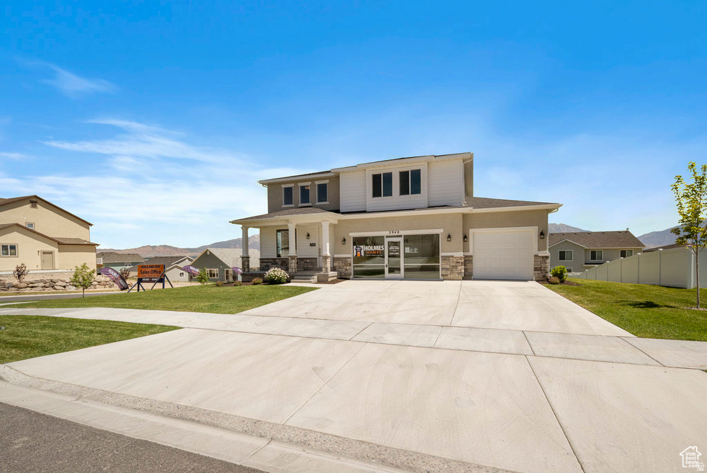 Brand new lot release in the beautiful Oquirrh West Community by Holmes Homes. One of only 3 more remaining lots that accommodate 3 car garages or RV parking. This Spacious home offers a grand entry/front room with 18 foot ceiling height and tons of natural light. Plus the perfect kitchen/greatroom and a den all on the first floor. Upstairs you have a large versatile loft for an additional living room and 4 bedrooms. It is tough to beat the kitchen and Owners Suite on this home. This plan offers a 3 or 4 car garage. This exciting community and surrounding areas are growing fast and have quick access to multiple highways, SLC airport, concert venues, restaurants, and more. Come build your dream homes today, where we allow you to pick from our structural options, exterior styles, interior and exterior colors and finishes, so that you can truly call this home your own. Pricing is listed at the base price and lot premium for large lot. Photos are of previous Tristyn model home.