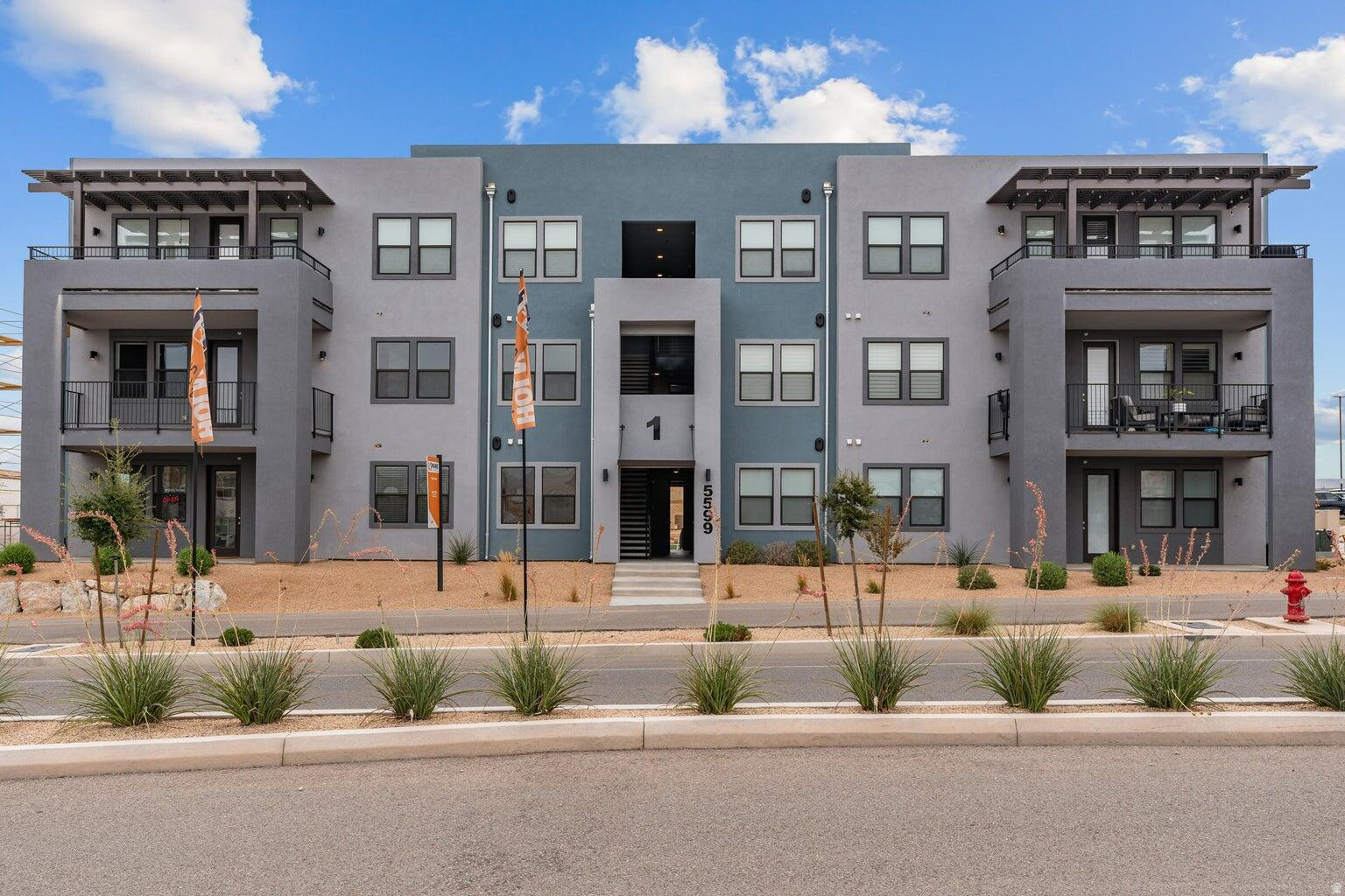 New Price Improvement - Move-In Ready 2 Bedroom Condo! Brand-new construction by Holmes Homes in the incredible Desert Color! This 2-bedroom, 2-bath condo with a 1-car garage features main-level living with 9-foot ceilings, modern finishes, stainless steel appliances, and quartz countertops throughout. Top-floor unit offering a bright, airy layout and thoughtful design.
