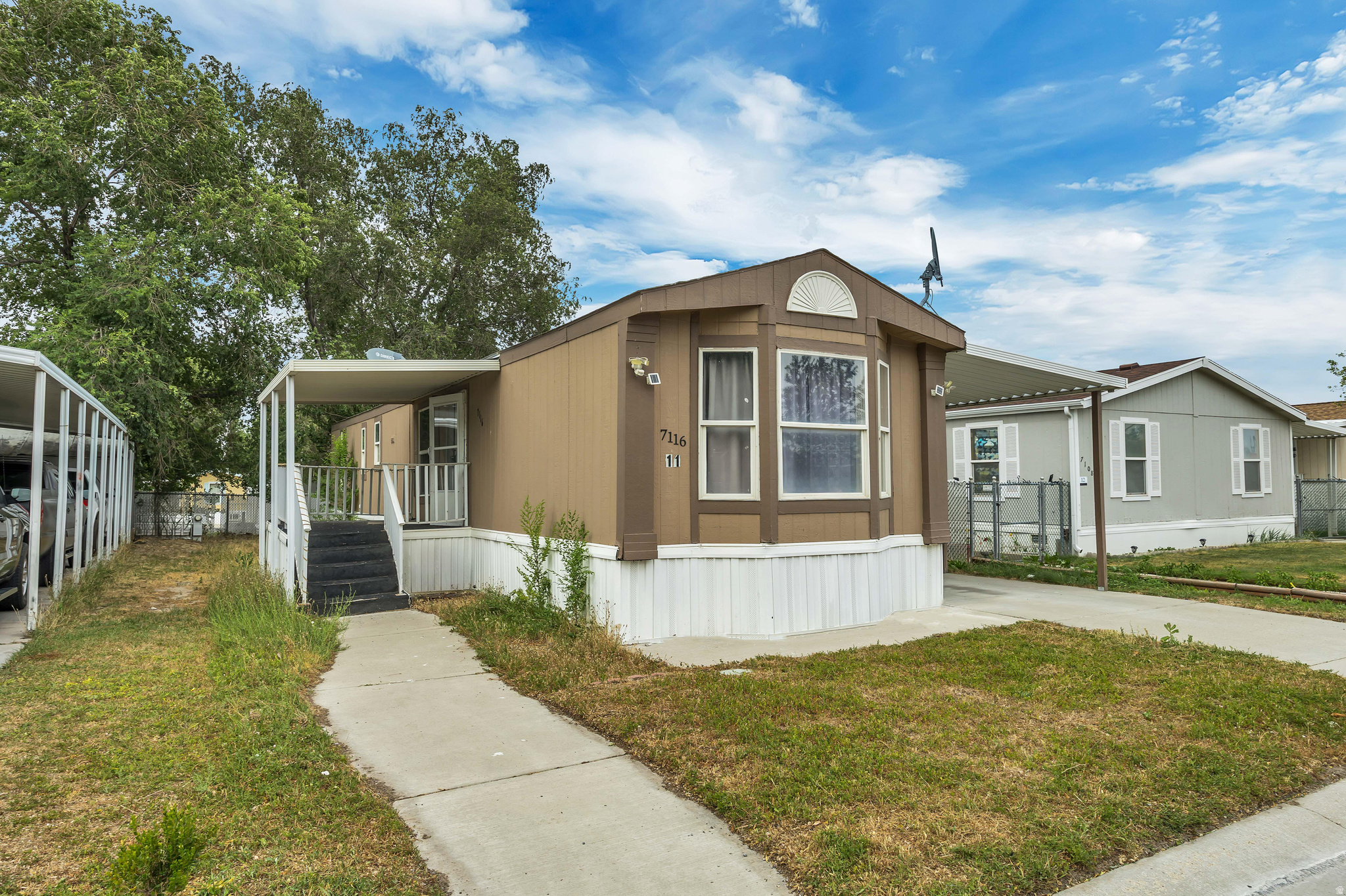Well-maintained 2-bedroom, 2-bathroom manufactured home located in a quiet, welcoming community. This home offers comfortable living with a covered carport that fits up to 3 vehicles. A great option for first-time buyers, those looking to downsize, or anyone seeking an affordable home. Conveniently located near shopping, restaurants, parks, schools, and major roads for an easy commute. Buyer is encouraged to verify all information, including square footage, through independent measurements.