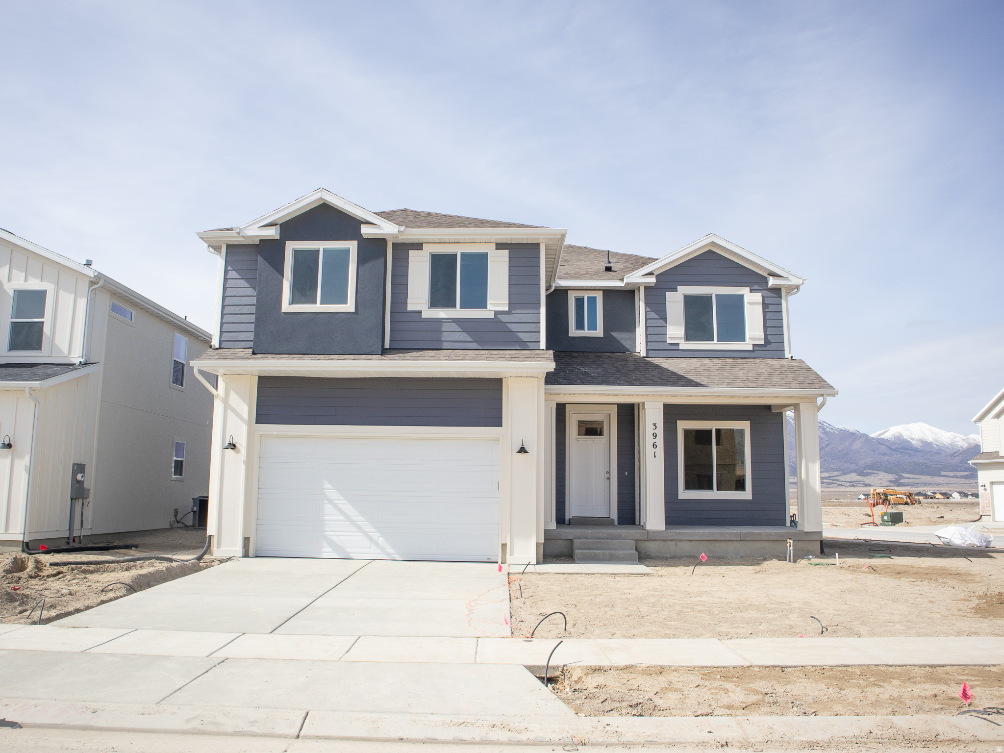 INTEREST RATES STARTING AS LOW AS 4.99% with our preferred lender or AMAZING $15,000 INCENTIVE TOWARDS CLOSING COSTS, RATE BUYDOWN, OR PRICE REDUCTION REGARDLESS OF LENDER! (Talk to agent for conditions). Must-see Harmony Community in Eagle Mountain! Move-in ready! This beautiful home built by Flagship Homes features 4 bedrooms + loft, 2.5 bathrooms, quartz slab countertops, painted cabinets, laminate flooring on the main level, an extended front porch, landscaped front yard and 2 car garage. The backyard can be landscaped for an additional charge. The primary bedroom has a vaulted ceiling, large walk-in closet, and dual sinks with a separate tub/shower. With an unfinished basement, this home provides space for storage and room to grow. (If preferred, basement can be finished for an additional charge.) 1GB fiber optic internet included in the HOA dues. Call for more information or stop by our model home at 656 E. Nathan Street, Eagle Mountain for a tour. Model home hours: Monday-Saturday 11 AM - 6 PM. Buyers to verify all information. Square footage is from house plans.