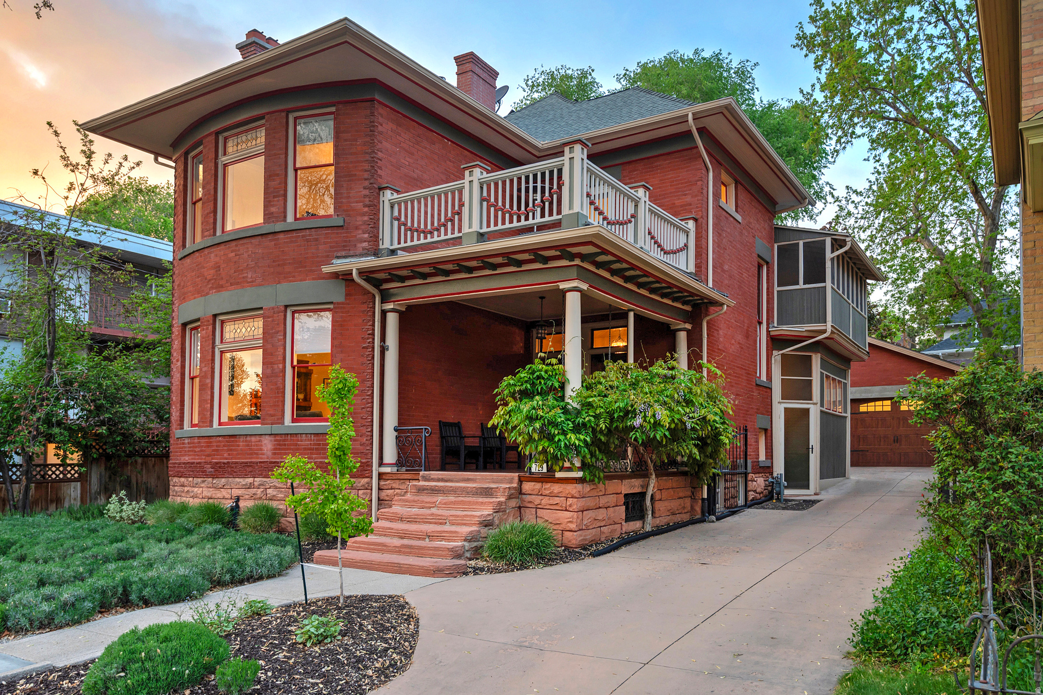 Nestled in the cherished Avenues, this beautifully updated historic home blends timeless architecture with the comfort and efficiency today's buyers crave. Boasting 5 bedrooms and 4 full bathrooms, it sits on a solid foundation of exceptional bones and thoughtful upgrades throughout. The heart of the home is the expansive primary suite, a true retreat that features a cozy fireplace, a private sitting room, an updated en-suite bathroom, and attached laundry quarters for ultimate convenience. The kitchen received a full update in 2022, showcasing all-new appliances and a professional-grade Wolf induction cooktop. It flows gracefully into inviting living and dining spaces warmed by two gas fireplaces, creating a welcoming ambiance for daily life and entertaining alike. Recent improvements include fresh interior paint and refinished floors, along with paid-off solar panels that enhance energy efficiency. Modern comfort is evident in every detail: EV charging in the garage, motorized blinds in the living room, dining room, kitchen, and primary bedroom, and a dependable forced-air heating system with central air Conditioning. The basement expands the possibilities with a full mother-in-law suite complete with kitchen and laundry hookups, adding versatility for guests or extended family. Outdoor living is equally impressive, with two second-floor decks offering elevated views and private outdoor escape routes. Step outside to a private backyard oasis featuring a paver patio, a swim spa, and low-maintenance landscaping sustained by a full drip irrigation system. The front yard welcomes you with fragrant lavender in bloom, setting a tranquil tone as you arrive home. A detached oversized garage, gated full driveway, and move-in-ready condition complete the package, inviting you to enjoy all the Avenues lifestyle has to offer.