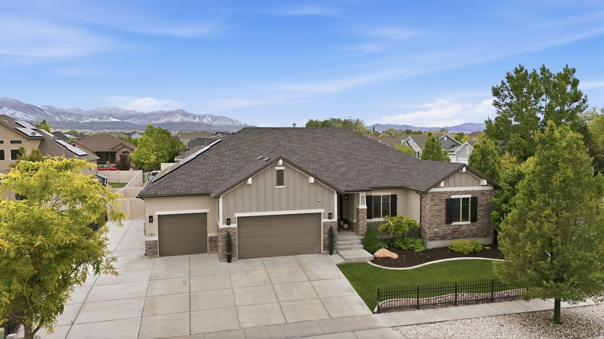 Beautifully maintained home in the heart of Stansbury Park featuring an open-concept layout with abundant natural light and functional living spaces. The kitchen offers ample cabinetry and counter space, flowing seamlessly into the main living area - perfect for everyday living and entertaining.  The primary suite includes a fully remodeled, spa-like bathroom, creating a private retreat. Additional bedrooms offer flexibility for family, guests, or office space, along with great storage throughout the home.  Enjoy a spacious backyard designed for outdoor entertaining and relaxation. Home includes solar panels with Tesla battery system for energy efficiency. Conveniently located near parks, schools, golf course, and with an easy commute to Salt Lake City.
