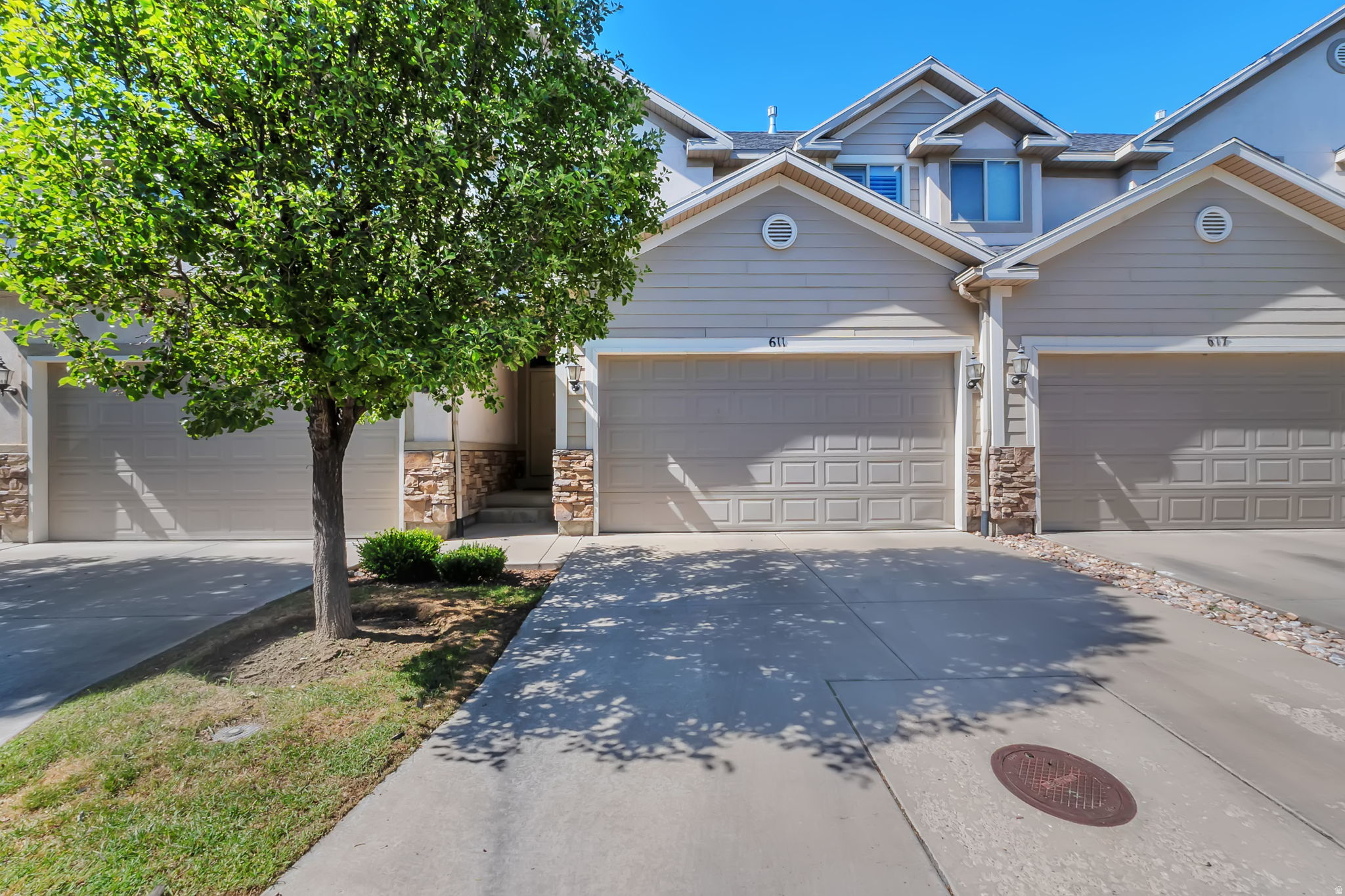 Welcome to this well-maintained and move-in-ready townhome featuring 3 bedrooms, 2.5 bathrooms, and a spacious open-concept floor plan. The bright living area flows seamlessly into the modern kitchen, complete with stainless steel appliances, ample cabinet space, and a large island perfect for entertaining.  The primary suite offers a walk-in closet and private ensuite bath. Additional highlights include an attached garage, convenient upstairs laundry, and a private patio for outdoor relaxation.  Located in a desirable community close to shopping, dining, parks, schools, and major commuter routes. Enjoy low-maintenance living with community amenities and beautifully maintained grounds.  Don't miss this opportunity to own a stylish and comfortable townhome in a prime location. Schedule your showing today!