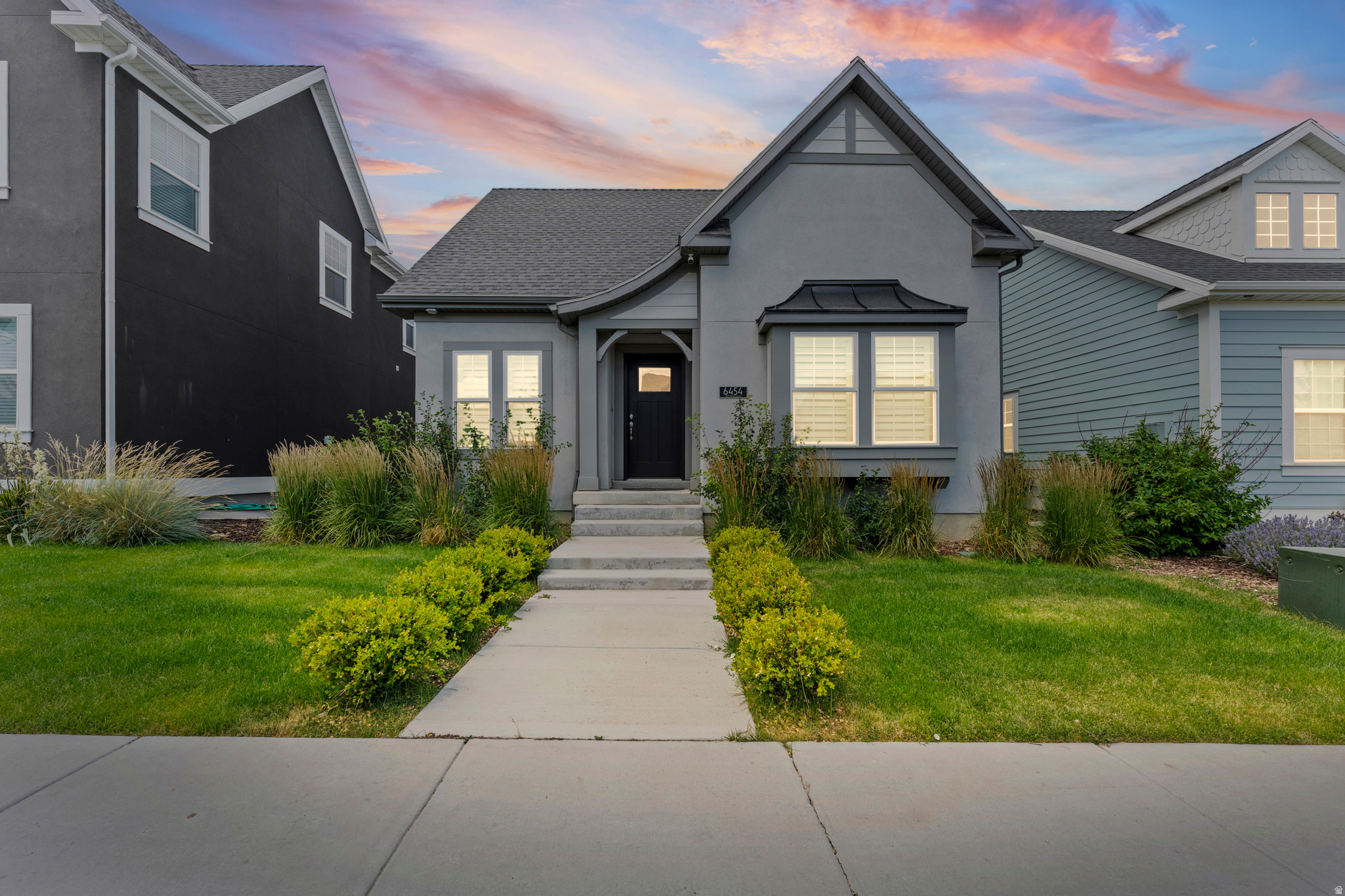 Step into this immaculate, move-in ready 3-bed, 2-bath gem where fresh finishes and thoughtful upgrades set the tone from the moment you walk in. The location is hard to beat - minutes from the tranquil Watercourse, the Bees baseball stadium, direct access to The Spoke bike course and surrounding parks that make weekend adventures effortless. All of this sits within the highly desirable Daybreak community, where resort-style amenities are practically at your doorstep. The flexible lower-level room works beautifully as either a bedroom or family room. The remainder of the unfinished basement provides many options as your needs evolve. Modern comfort, unbeatable connectivity, and a community that has it all - this one checks every box.