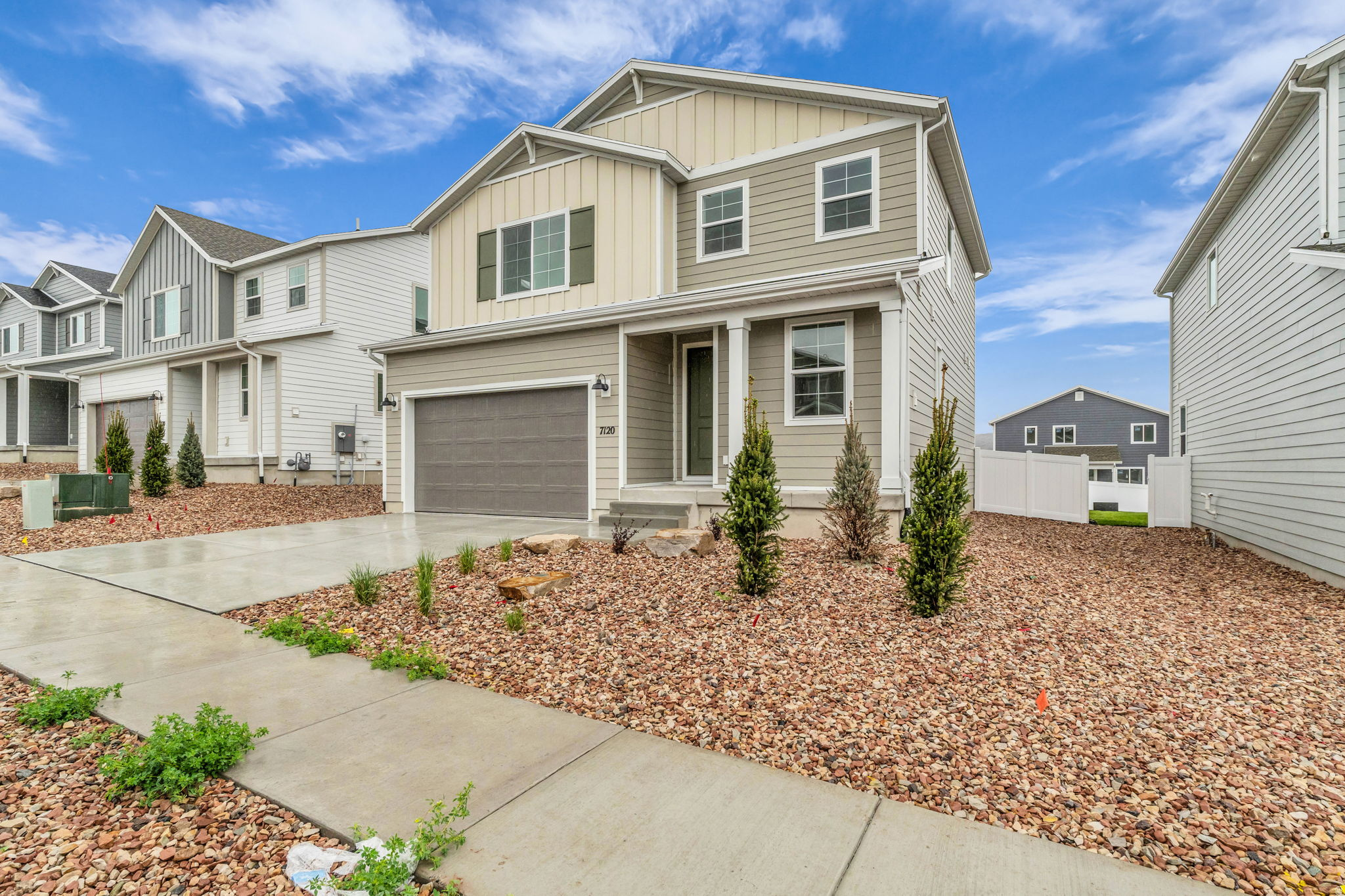 Best valued new construction home in all of Park City! Move in ready, new construction home located in Silver Creek Village. Take a step inside to see the beautiful hardwood lvp flooring, a convenient laundry-mud room off the entryway, bright finishes and a cozy linear gas fireplace in the living room . The kitchen features shaker cabinets, stainless steel appliances, a double oven setup including a gas range with a hood, quartz countertops and a kitchen island with seating for three. You can enjoy your morning cup of coffee out back under the covered patio as you take in the mountain views from the privacy of your fully fenced yard. Home Energy Rated & NGBS Green Certified Home, designed with efficiency and sustainability in mind from the xeriscaped yard to the High efficiency HVAC system and Tankless hot water heater. The lower level of the home features a full sized bathroom, living room and one of the home's private bedrooms. The upstairs level features an open loft area great for a home office, gym or play area for kids as well as three bedrooms, including the primary bedroom suite. The home is conveniently located near hiking and biking trails, shopping centers, restaurants, parks, and other amenities, making it an ideal place to call home for both full-time residents and vacationers alike, schedule your showing today.