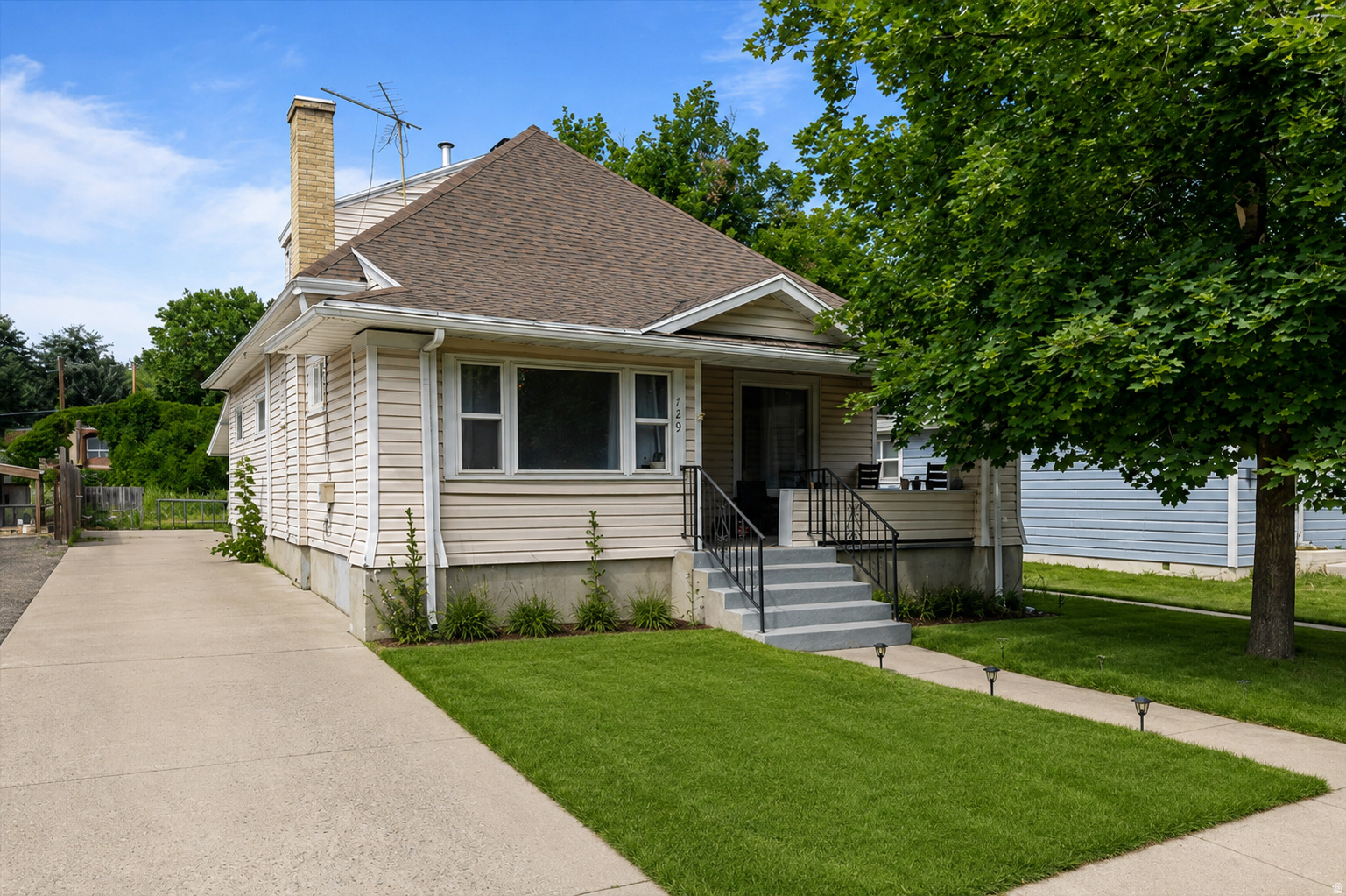 LOCATION MEETS HISTORIC CHARM and rental potential on a spacious 0.19-acre lot in Logan's highly competitive Wilson Neighborhood, this two-unit multi-family property is a rare find. Boasting over 2,500 square feet of total living space, the property features a roomy 4-bedroom main layout alongside a private lower-level studio apartment. Live in one unit and let your tenants help pay your mortgage, or rent out all two spaces to maximize your ROI in a high-demand student and professional market. Don't miss out on this investment just minutes from downtown Logan and campus. Corners will be professionally surveyed/staked. Additional land available.