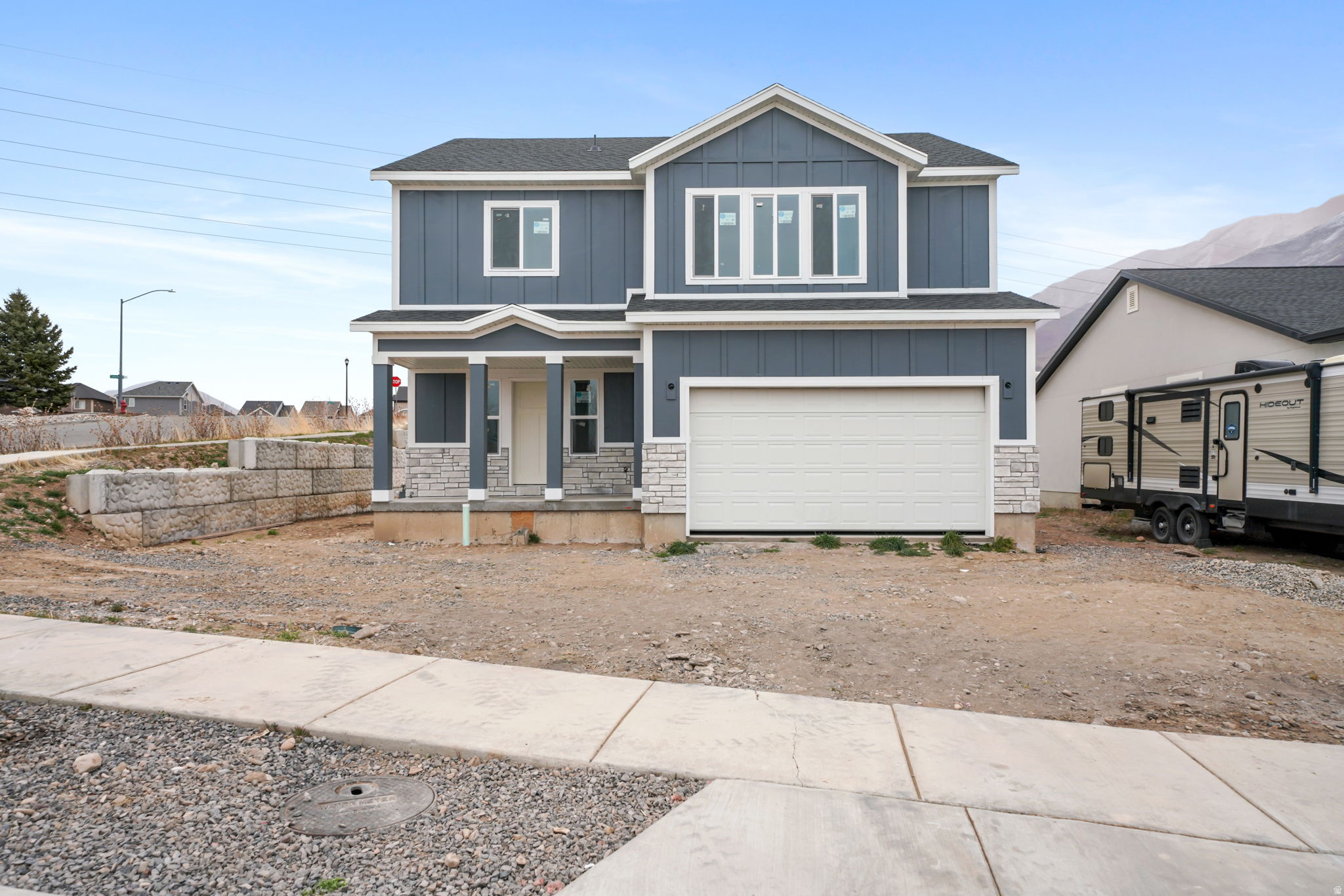 Brand-new single-family recently completed home in a desirable Spanish Fork neighborhood. Thoughtfully designed with modern living in mind, this home will offer a functional floor plan. Spacious living areas, well-appointed bedrooms, and a contemporary kitchen layout are planned to accommodate both everyday living and entertaining. Conveniently located near schools, parks, shopping, and quick access to major routes. Estimated completion date subject to change. Square footage figures provided as a courtesy estimate only; buyer to verify all information.