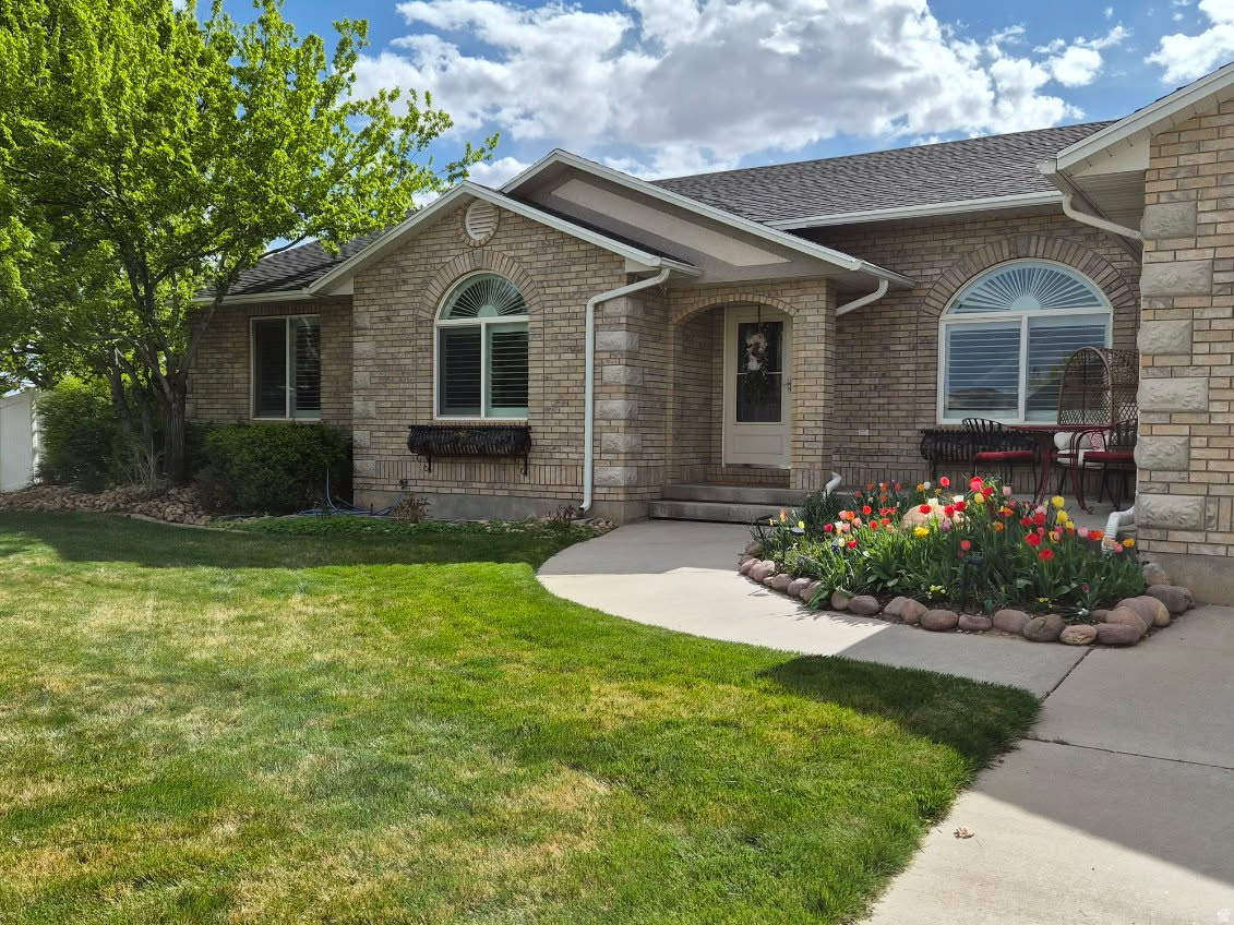 Step into luxury in this 6 bedroom home in a wonderful Maeser location.  This home has it all and is over 4,000 square feet. Filled with storage galore and tons of upgrades.  Large open laundry room is a homeowners dream - take a look at the outside with landscaping and privacy.  Hot tub, gazebo, water feature and fruit trees complete this beautiful yard.  Detached all brick workshop plus extra building lends to more storage and custom quality.