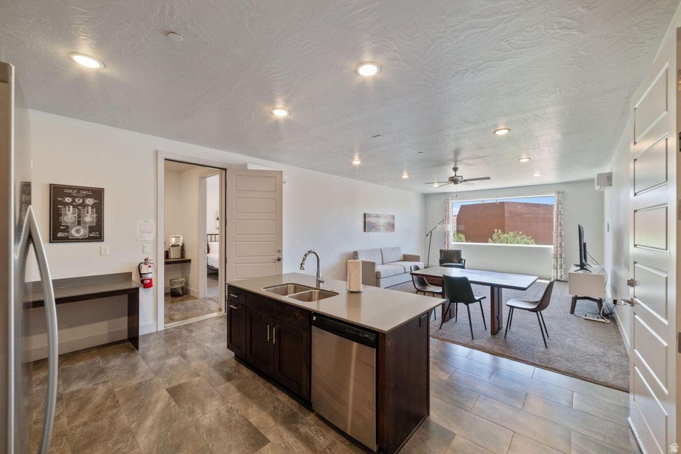 Presenting units 106 & 108 in Sand Hollow Resort being sold together! This incredible nightly rental being sold completely turnkey features two beautifully appointed suites with private patios, offering unmatched comfort and flexibility. The suites can be rented separately or together and include a full kitchen, living room, and washer & dryer. Making it super convenient and reliable. Enjoy first-floor access to the resort pool directly off the patio-perfect for a quick walk to fun in the sun. This property is fully furnished and is ready for immediate short-term rental or personal use. Situated in a prime location, you'll have access to the world-class Sand Hollow Golf Course and all the exceptional resort amenities, including a sports court, clubhouse, pool, spa, and more. Located just moments from Sand Hollow State Park, Quail Creek Reservoir, and the famous sand dunes, this property offers endless outdoor adventures at your fingertips.
