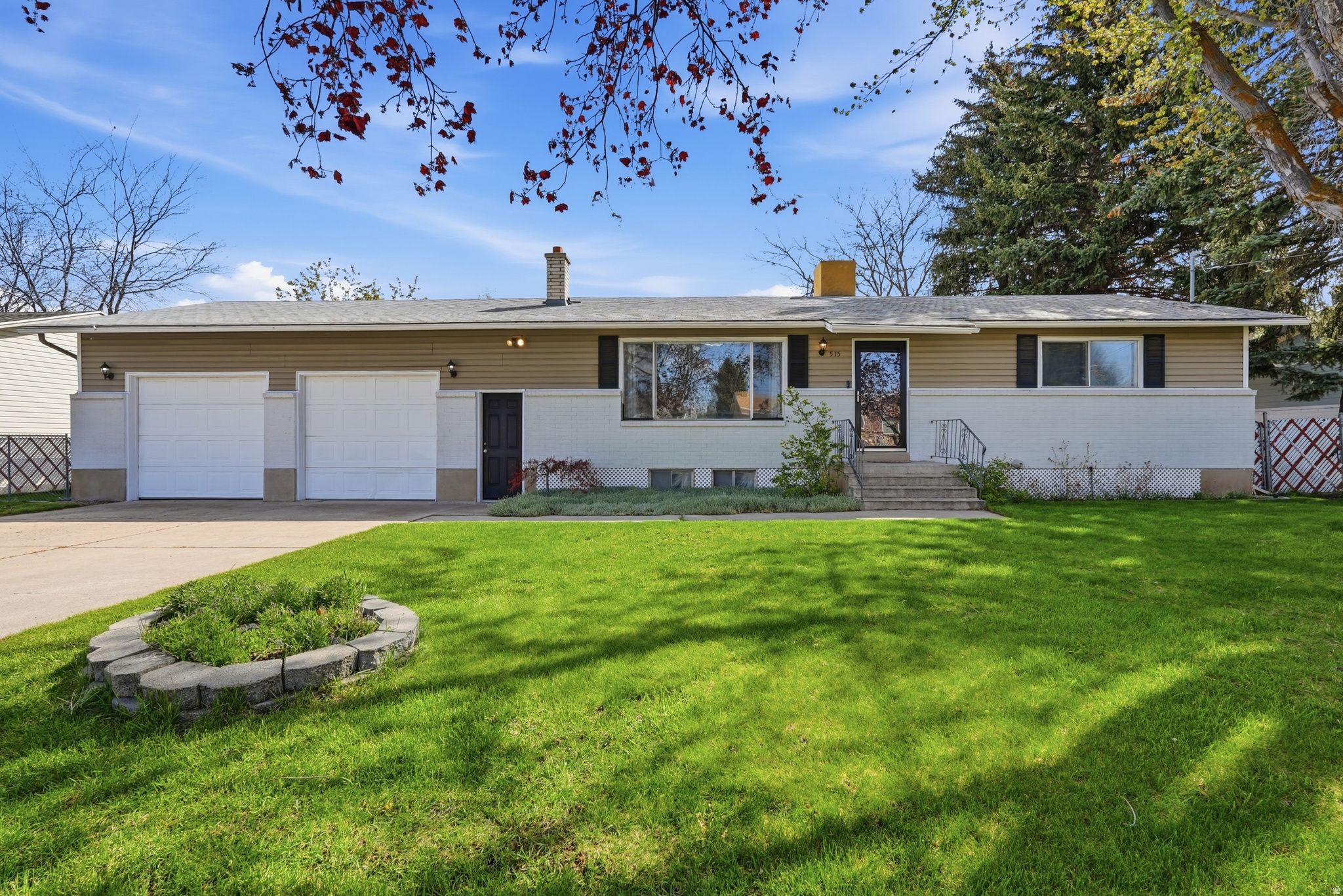This is the entertainer's house. Backyard BBQs will be at your place. Step out from the kitchen onto the patio and into a spacious yard with mature trees along the south side creating added privacy, plus a large garden with rich, workable soil and its own watering zone for easy, manageable upkeep. Plenty of room to gather, host, and unwind. Inside, the layout is bright and functional with great natural light, especially in the kitchen with its oversized windows.  The GARAGE is the dream. Oversized, deep, with vaulted ceilings and a loft for storage, projects, or a full workspace setup. Downstairs adds even more storage, giving you room for everything without cluttering your living space. Clean and move-in ready, with the chance to update and make your own.