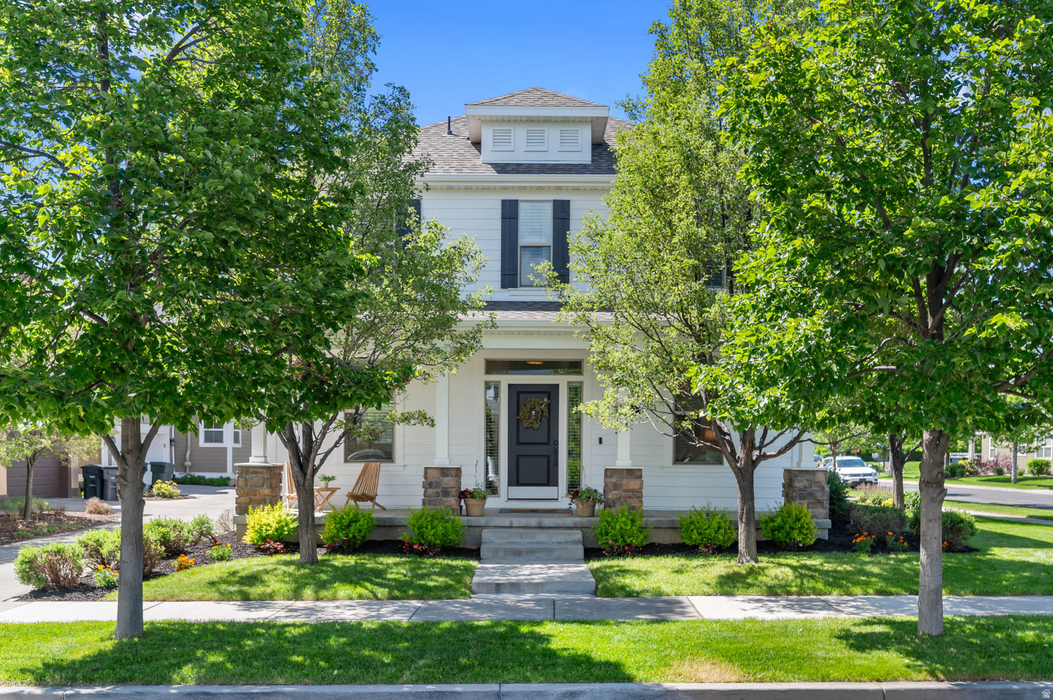 No More Showings! ***MULTIPLE OFFERS Received! All Offers must be in by Monday Night - June 1, 2026 at 8:00pm*** This beautiful Daybreak home in the heart of the Eastlake community has been extensively updated and continually maintained since ownership began in 2015. Major remodel completed by Morley Homes (October 2023), including luxury vinyl plank flooring throughout main floor and upstairs, full interior paint on main and upper levels, six-inch baseboards throughout main and upper levels, open stair railing system with rod spindles replacing drywall half-walls, premium stair carpet, flush-mount puck lighting throughout main floor, updated kitchen hardware, replaced supply/return grilles and register covers, and bathroom fan timers installed. Kitchen remodel completed in 2018 by Excel Cabinets featuring quartz countertops and a deep-sink installation. Shiplap accent walls and a dedicated homework station added to the kitchen and dining area (2018), and kitchen cabinets painted white (2020). LG dishwasher replacement (November 2022), Cafe microwave replacement (March 2023), Cafe electric slide-in double oven/range replacement (April 2023), and Cafe four-door French door refrigerator replacement (December 2023). Professionally finished basement completed with permits and city inspections passed (2020), including drywall, electrical, plumbing, and HVAC work. Basement features premium carpet throughout (2020), dedicated bedroom/home office with soundproofing insulation and solid-core door (2020), Cat6 wiring throughout basement and TV/bedroom locations (2020), wired ceiling-mounted projector location, and Harry Potter under-the-stairs playroom.  Garage upgrades include professional polyaspartic garage flooring installed by Garage Kings Salt Lake City (August 2021), custom 200 sq ft garage mezzanine/storage loft (2016), pull-down ladder access (2016), professional overhead garage storage racks, Chamberlain side-mount garage door opener installed by Cole's Garage Door (February 2025), plus garage door spring tune-up and laser safety sensor replacement completed during same service visit (2025).  Mechanical and utility improvements include Rheem Classic Series Professional 50-gallon natural gas water heater replacement (2020), expansion tank replacement (2020), AC tune-up and capacitor replacement by Western Heating, Air & Plumbing (July 11, 2025), furnace tune-up and inspection by Western Heating, Air & Plumbing (September 12, 2025), indoor sprinkler shutoff ball valve replacement by Evolution Plumbing, Heating & Air (November 7, 2022), both exterior hose bibs professionally replaced (2023), LG Smart front-load washer and electric dryer replacement (April 2024), steel-braided washer hoses installed (2024), and regularly maintained dryer vent cleaning with most recent service completed (November 2025).  Exterior and landscaping improvements include Rachio smart sprinkler controller installation (June 2024), all sprinkler nozzles replaced (June 2025), IFA four-step lawn care program maintained for over 10 years, regularly maintained sprinkler drip lines, full exterior professional paint completed by iCity Painting (Spring 2020), black faux shutters added during exterior repaint (2020), professional tree trimming by arborist Tracy Walk (May 2024), front sidewalks replaced by the city (Fall 2025), house power washed and exterior gutter leak repaired (May 2026), and window well covers installed shortly after move-in (2015).  Additional smart home and interior features include Nest thermostat, Ring video doorbell, keyless front and back door entry, USB charging outlets throughout the home, dimmer switches throughout, front exterior lighting on automatic timer, attic antenna wiring, decorative fireplace installation, custom laundry room shelving, and lever-style door hardware throughout main and upper floors. Snow removal for the shared driveway is fully maintained by the HOA.. Home is steps away from a neighborhood park visible from th