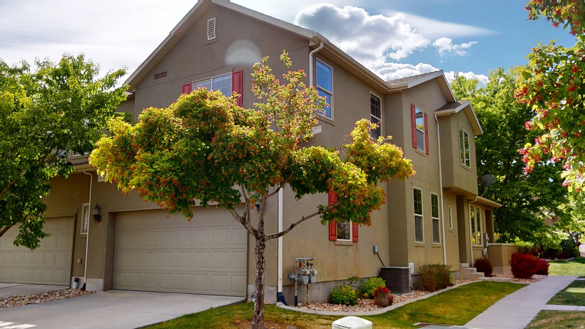 Welcome home to this beautifully maintained end-unit townhome in the highly desirable Benson Mill Crossing community! This 3-bedroom, 2-bath home offers 1,749 square feet of comfortable living space with an open and functional layout. The bright kitchen features granite countertops, a gas range, and plenty of cabinet space, while vaulted ceilings and large windows create an inviting and airy feel throughout. The spacious primary suite includes a walk-in closet and separate tub/shower setup for added comfort. Enjoy the convenience of a 2-car attached garage, full landscaping maintenance through the HOA, and a great location close to parks, schools, shopping, and easy commuting access. Whether you're a first-time buyer, downsizing, or looking for low-maintenance living, this move-in-ready home is one you won't want to miss!   Square footage figures are provided as a courtesy estimate only and were obtained from Tax records.  Buyer is advised to obtain an independent measurement.