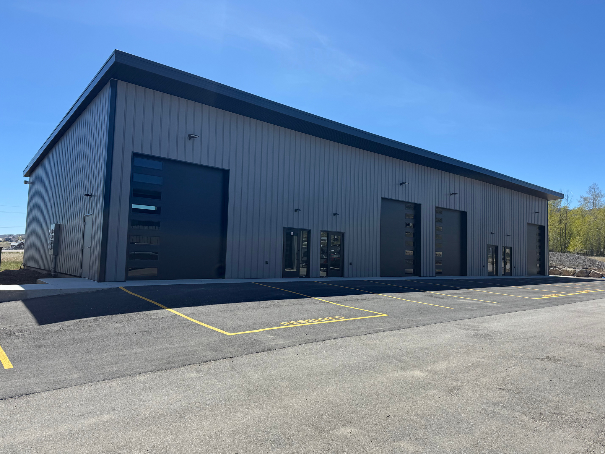 New flex units in the heart of Garden City, UT. Fully finished and complete with a restroom, heat and high bay lighting. 12x14 overhead doors with top quality openers. These units are ready for a wide array of business uses. See other listings for different unit sizes.