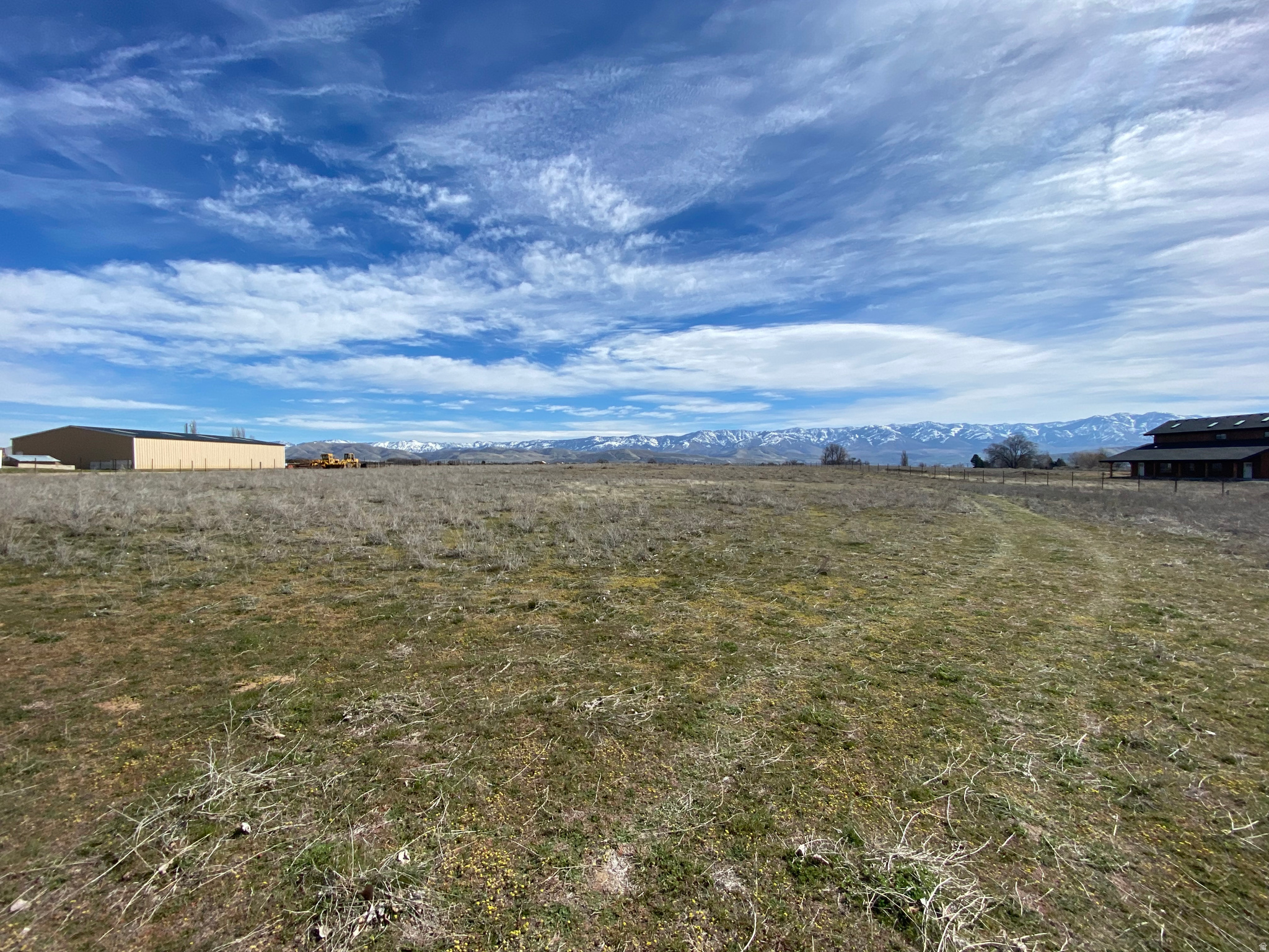 5 Acre Building Lot located just outside Preston.  The property is nearly 100% fenced.  The fence is completely fenced on the East, West, & South boundaries, all of the fence posts on the North boundary are set and the material to finish North boundary fence will be included with the purchase.  The property has pressurized irrigation stubbed to the lot.  Property is zoned R1 which allows for 1 acre lots.  Information is provided as a courtesy only.  Buyer and buyers agent to verify all info.