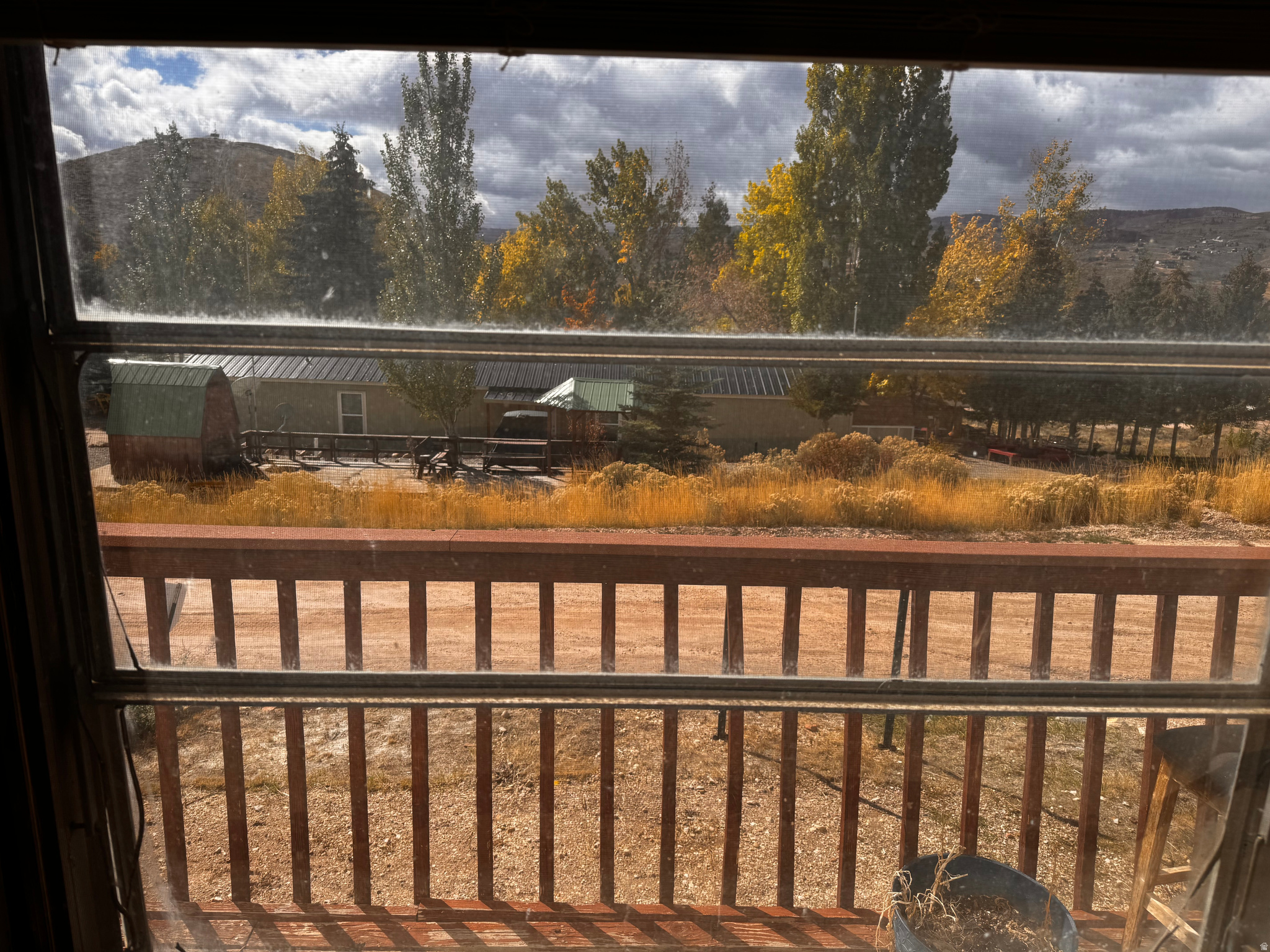 This property needs a little love but has such AWESOME potential. Wood burning stove with some newer vinyl windows. Large 10X24 south facing deck,  with wonderful views of the meadow below. Enjoy year round living or weekends at the lake. Take advantage of SELLER FINANCING on this wonderful investment.