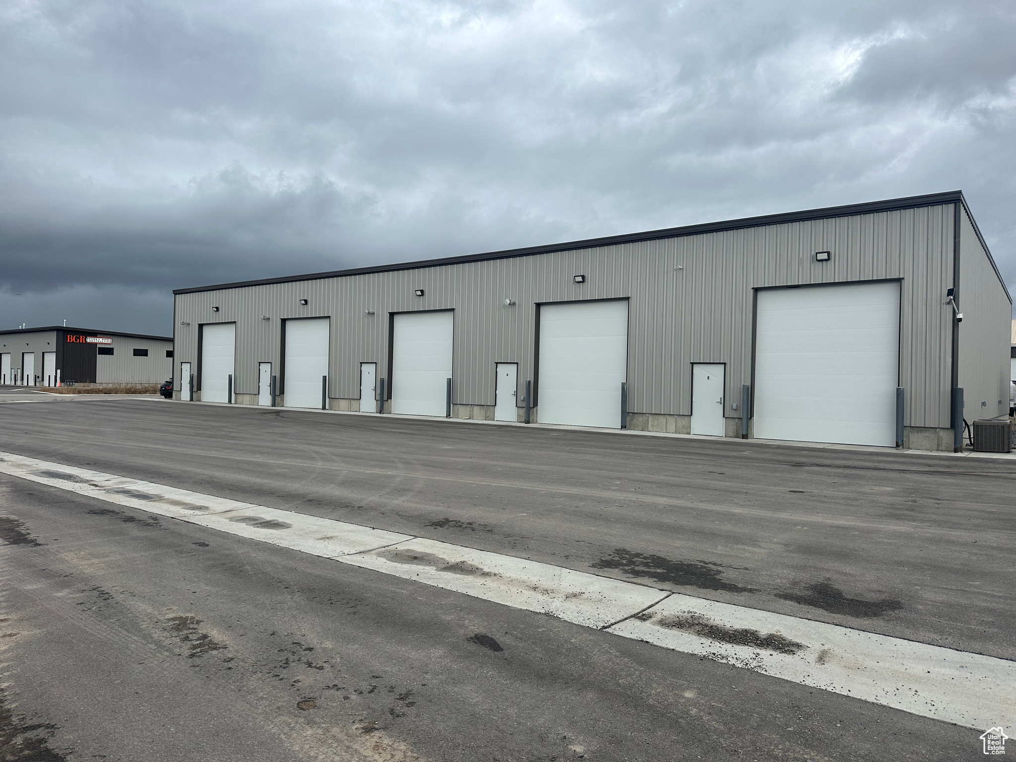 2 units of  commercial/industrial space available for lease. Units C and D are individual units. The units could be opened up and rented out as one large unit if wanted. Each unit leases for $1,500 per month. Lessee pays rent, heat, gas and renters insurance. Lessor pays for water, taxes and insurance on building. Additional office space, walls etc. could be added for an additional cost. Private bathroom with open shop space. 12'x14' overhead door. Front of unit is 20' to ceiling and 18' towards the back of the unit. All Lessee's must be willing to sign Lessor's own lease agreement. Square footage figures are provided as a courtesy estimate only and were obtained from county records. Buyer is advised to obtain an independent measurement.