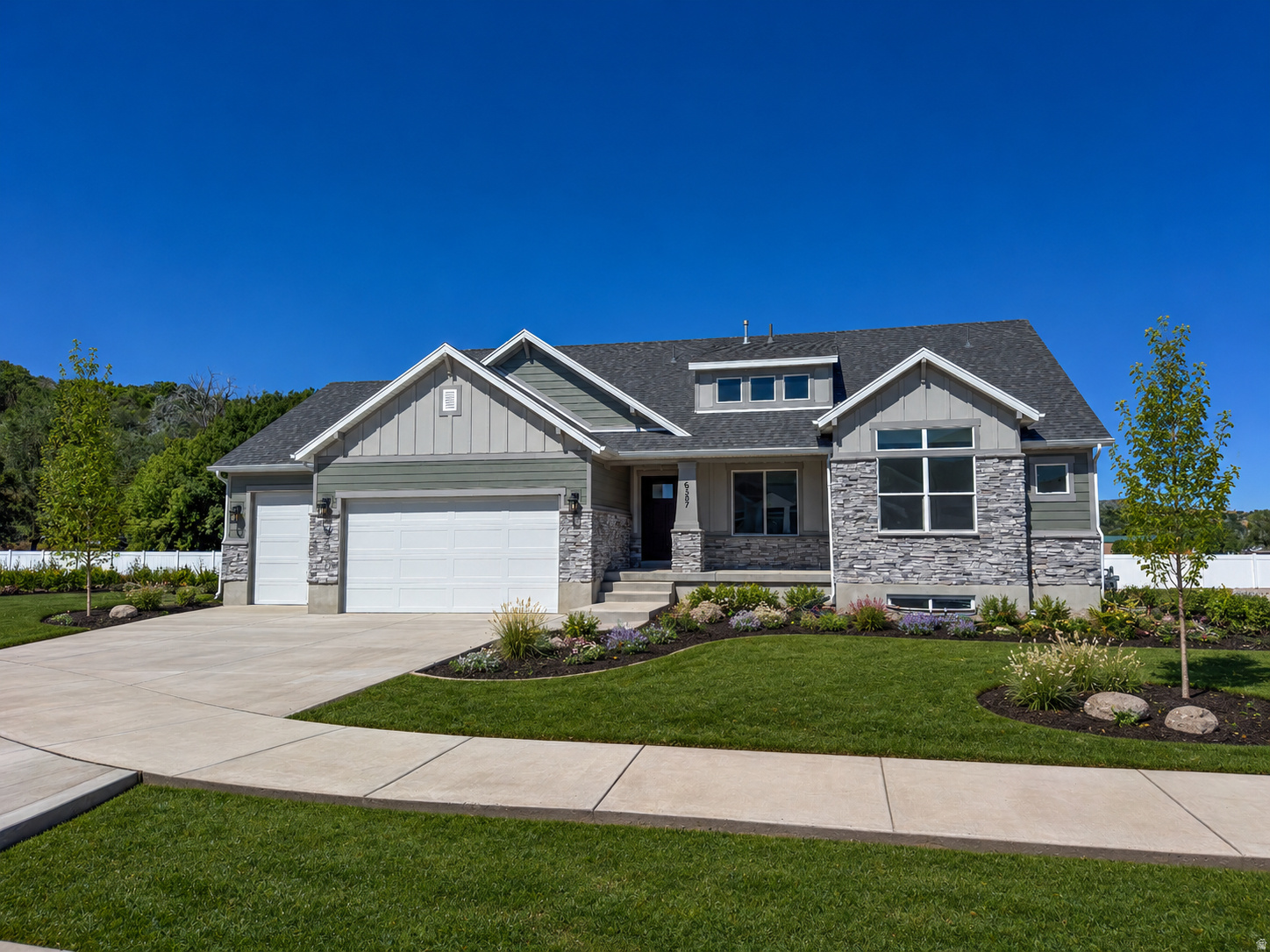 Gorgeous Riverwood community with NO HOA, no backyard neighbors and stunning mountain views! Our Monterey home design features an open-layout with vaulted ceilings.  Enjoy a spacious gourmet kitchen, huge pantry, oversized mudroom and living area ideal for entertaining. With a 4-car garage, there's no shortage of space for vehicles, toys, or storage. The unfinished basement affords tons of room for future growth with 3 bedrooms and plumbed and ready to go for 2 bathrooms, laundry room & future kitchen. Pickleball courts & park nearby or the nearby golf course just down the road. All of this is just minutes from US-89,I-84, I-15,Hill Air Force Base & Northrup Grumman. Don't miss your chance to call Riverwood home - where comfort meets convenience in one of South Weber's most desirable new communities. Come view this home today!