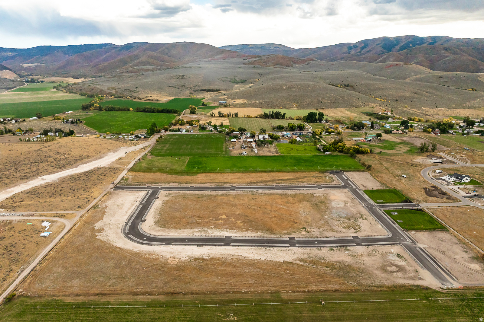 Experience the ultimate in luxury living at Meadow Views, a prestigious development comprised of 21, 1-acre estate lots nestled in the heart of Heber Valley. With breathtaking views, fully irrigated, spacious acre lots, and a variety of design and build options, Meadow Views offers the perfect blend of natural beauty and modern convenience.