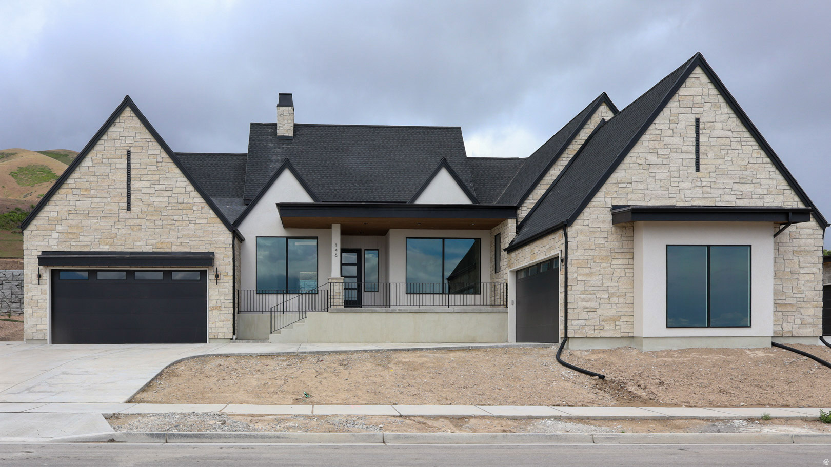 Beautiful "Dunbar" rambler floorplan in the Transitional style, 3 beds, 2.5 baths, 4-car garage.  Open family/kitchen layout, 10' ceiling on main, large kitchen with butlers panty, custom cabinetry, Jenn-Air gas appliances, gas range 48" range, specialized lighting, extended ceilings in family room & bedroom 1, 42" upper cabinets w/ crown molding, upgraded cabinet features: soft-close, quartz & quartzite countertop, laminate throughout the kitchen, dining and family, bedroom 1 suite, grand bath with free standing soaking tub, separate walk-in shower and 2nd vanity sink, and stackable washer/dryer hookups, 2 large other bedrooms with jack & jill bathroom & 1/2 guest bathroom. Large Covered Deck with Patio below.   Laminate floor throughout the kitchen, formal dining room, family room, & separate flex/office space.  Powder room located next to the garage entry and mud room bench.  Full laundry room   Home includes unfinished basement with 9' foundation walls and an outside entrance, ready to build out future ADU, room for a large family room, possibility of 3 additional bedrooms, 2 full bathroom, kitchenette and under porch storage.  95% efficient furnaces, 50-gallon water heater, & plumbed for a soft-water system.  2 2 car garages and extra space on the side of the garage to add an RV pad.       ** Special Interest Rates are Available ** with our Builder Forward Commitment (BFC) if you use DHI Mortgage in addition to receiving up to $15,000 toward closing costs.  ****   *Ask me about our 4.99% Fixed rate mortgage.    Ask me about our generous home warranties, active radon Mitigation System, and Smart Home Package, which is included in this home.  The actual home may differ in color, material, and/or options. Pictures are of a finished home of the same floor plan and the available home may contain different options, upgrades, and exterior color and/or elevation style. Square footage figures are provided as a courtesy estimate only and were obtained from building plans. No representation or warranties are made regarding school districts and assignments; please conduct your own investigation regarding current/future school boundaries.