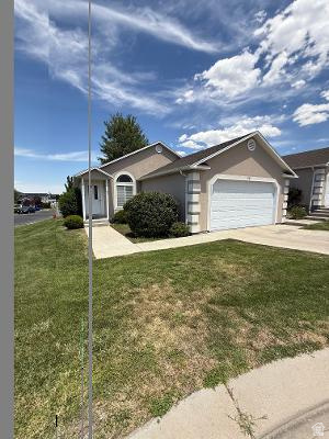 A beautiful, well kept condo is available in the sought after Oquirrh Cottages Community near the golf course. Beautiful finish tile in the primary bathroom. The kitchen offers newer appliances, A/C and  furnace. The roof  is also approximately 3 years old with a 30 year lifespan. A top of the line Nuvo soft water and filtration system was installed a few years ago. There is conveniently 2 laundry rooms both up and downstairs. The common area is beautifully maintained and is right outside your property. The lot itself offers plenty of space for entertainment and your pets and kids to play. A small garden is doable too. This is such a peaceful community and a great place to be! Come make us an offer!
