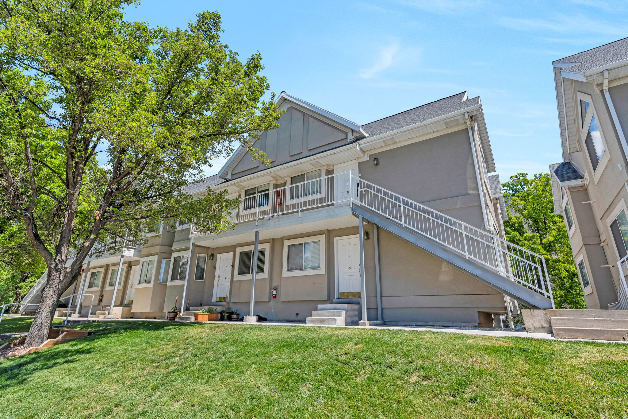 Wow come check out the nicest kept condo in East Provo! Minutes from BYU! Walk into an open & spacious floor plan with tall vaulted ceilings. Great quality hardwood floors that were just refinished. All new paint throughout and other touchups made. Furnace and AC replaced in 2022. There is one carport parking spot underneath the building, and also a designated storage room. Great for either an owner occupied OR a rental. Open parking in front and back. Terrific location just southeast of BYU. Restaurants, entertainment, and shopping all nearby. Easy access to the I-15 freeway. Come see it while it's still here!
