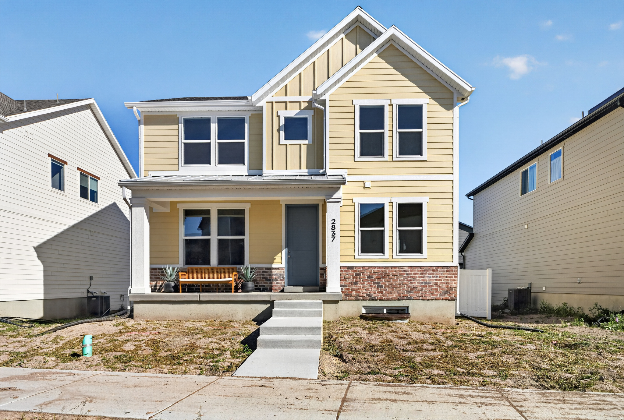 Farmhouse Vibes!!! Come fall in love with this brand new farmhouse 2 story. Truly move in ready with landscaping and fencing included. Walk from your front door to the first community park in under a minute and enjoy the incredible views of Ben Lomond peak while walking the trails in the community. Upgraded Features and quality throughout the home, highlights include a huge primary suite, oversized kitchen island and pantry, closets everywhere, and covered deck. More room for growth and storage in unfinished basement. Need help with closing costs or buying down your interest rate? Use one of our preferred lenders for amazing incentives and a no cost refinance for 3 years. Don't miss out. Landscaped photos are a representation, landscaping is not yet installed.