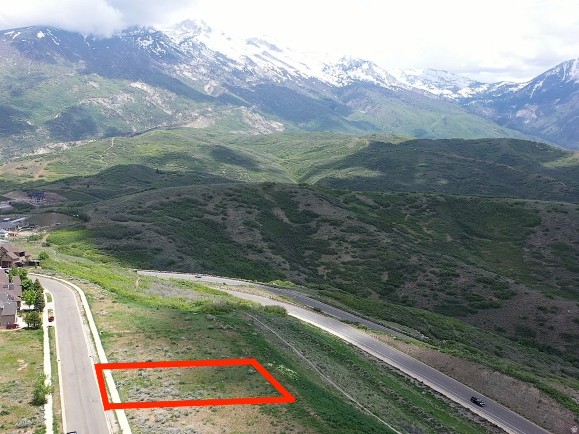 Claim your spot in Draper's coveted Suncrest community with this .17-acre homesite, perfectly sized for a custom build without the upkeep of a sprawling lot. Tucked along a quiet street with beautiful Wasatch Mountain and valley views, this parcel gives you a true blank canvas in one of the area's most desirable neighborhoods. The lot's layout lends itself well to a thoughtfully designed single or multi-level home that takes full advantage of the surroundings. Utilities are already in place, making your build process smoother from day one. As a Suncrest resident, you'll enjoy a clubhouse, pool, fitness center, and an extensive trail system right outside your door, plus easy access to Draper's restaurants, retail, and business hubs. Salt Lake City and Provo are a short drive away, and you're close to renowned ski destinations like Snowbird, Alta, and Sundance. Don't just buy land, build your future.