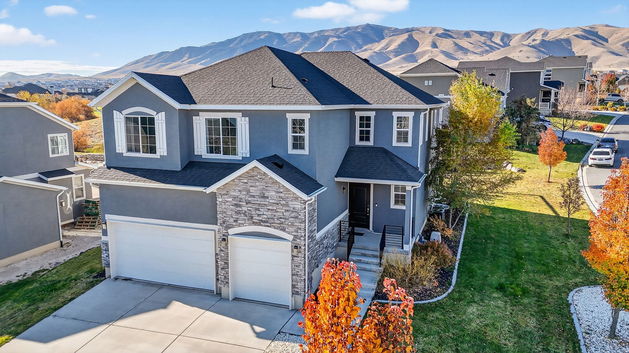 Experience the ultimate  in luxury living in this sprawling modern home, nestled within the  Ironwood community and situated just steps from Utah Lake and the Talons Golf Course along with breathtaking mountain views! The gourmet kitchen is a culinary dream, featuring a large island, tile backsplash, custom cabinetry and high end appliances, seamlessly blending with the open living room. Upstairs you'll enjoy 3 guest bedrooms, cozy loft and a large primary suite with an ensuite bath boasting a large soaking tub, walk in shower and expansive walk in closet. The fully finished basement offers versatility, with 2nd kitchen, bath, bedroom, family room and laundry room hookups plus a separate outside entrance.  Ideal for mother in law apartment, guests, or multi generational living. The backyard is fully landscaped complete with a pergola ready for a canvas shade covering, perfect for relaxation and entertaining.