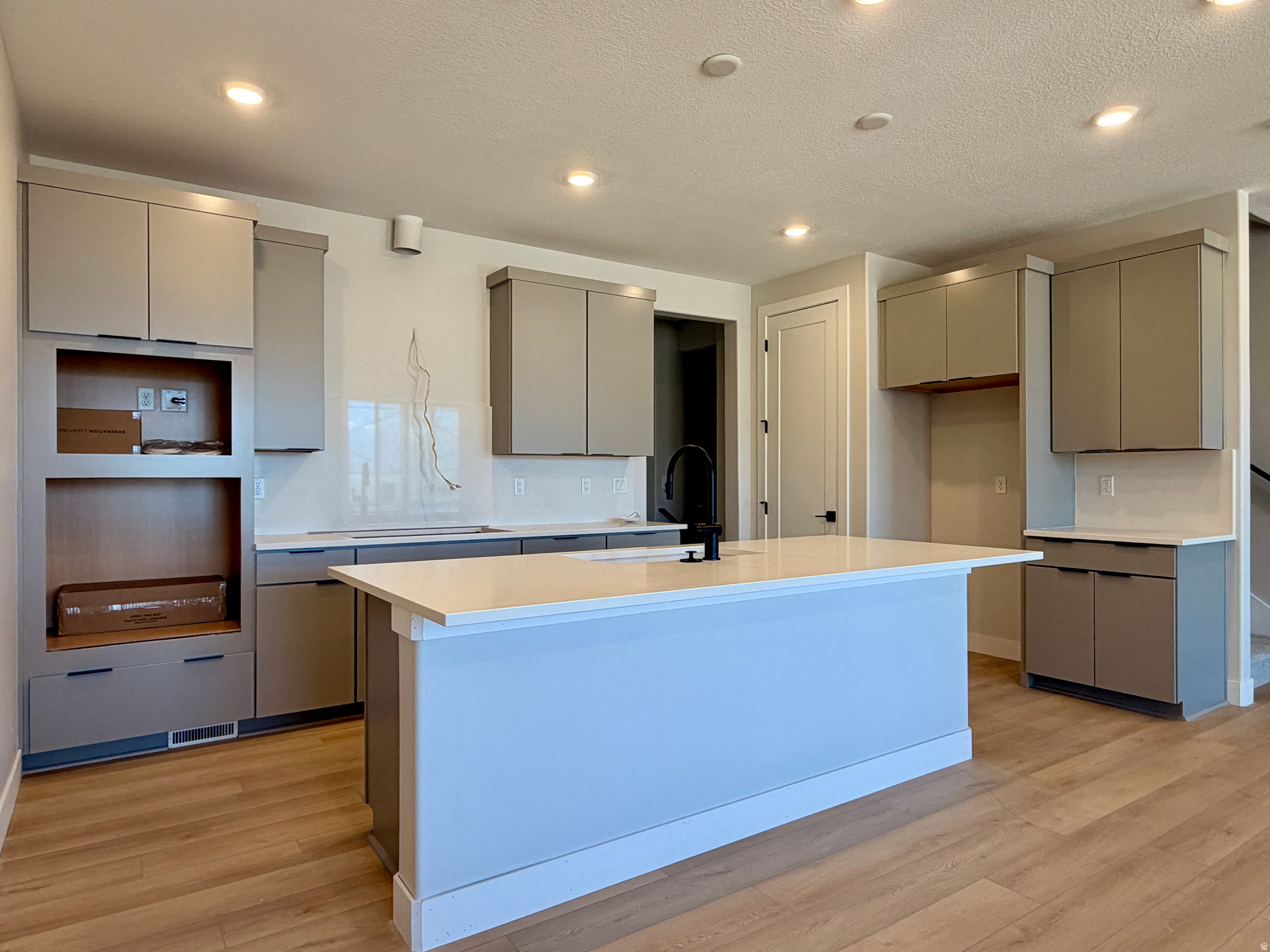 *Lot #98* This desirable Lodge Townhome features 4 beds, 3 full baths and powder room with professionally curated finishes and stunning views of the Wasatch Mountain Range. This home is nearly complete and ready for June move in! Please call or email me for more information on how to submit an offer. Buyer to verify square footage. No representation or warranties are made regarding school districts and assignments; please conduct your own investigation regarding current/future school boundaries. Sales Center Hours: Open Monday-Wednesday and Friday-Saturday from 10:00AM - 6:00PM.  Certain images in this listing have been digitally staged or enhanced via artificial intelligence. These photos are for illustrative purposes only and do not represent the actual current condition, layout, or furnishings of the property.