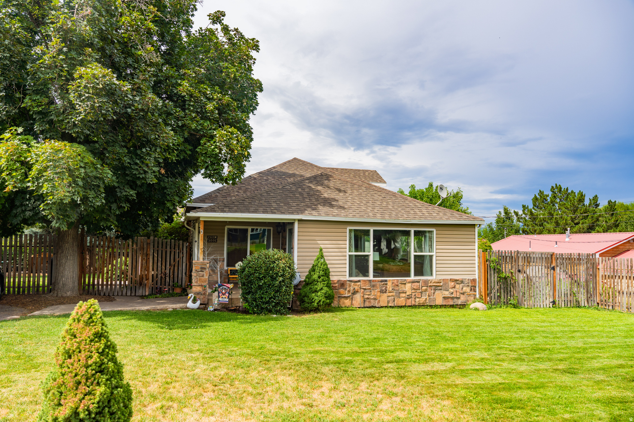 You don't want to miss this cozy home located just off Salem Pond. Situated on a cozy, fully landscaped lot, the outdoor space is a gardener's dream. Enjoy mature shade trees, a thriving vegetable garden, greenhouse, storage shed, and plenty of RV parking with room for your toys, trailer, or extra vehicles. Whether you're gardening, entertaining, or simply relaxing in the backyard, this property offers a peaceful retreat. Inside, you'll find tasteful updates that blend modern convenience with the warmth and character of an established home. Located in the heart of Salem, you'll enjoy small-town living with easy access to schools, parks, shopping, and outdoor recreation.   Square footage figures are provided as a courtesy estimate only and were obtained from county records.  Buyer is advised to obtain an independent measurement.