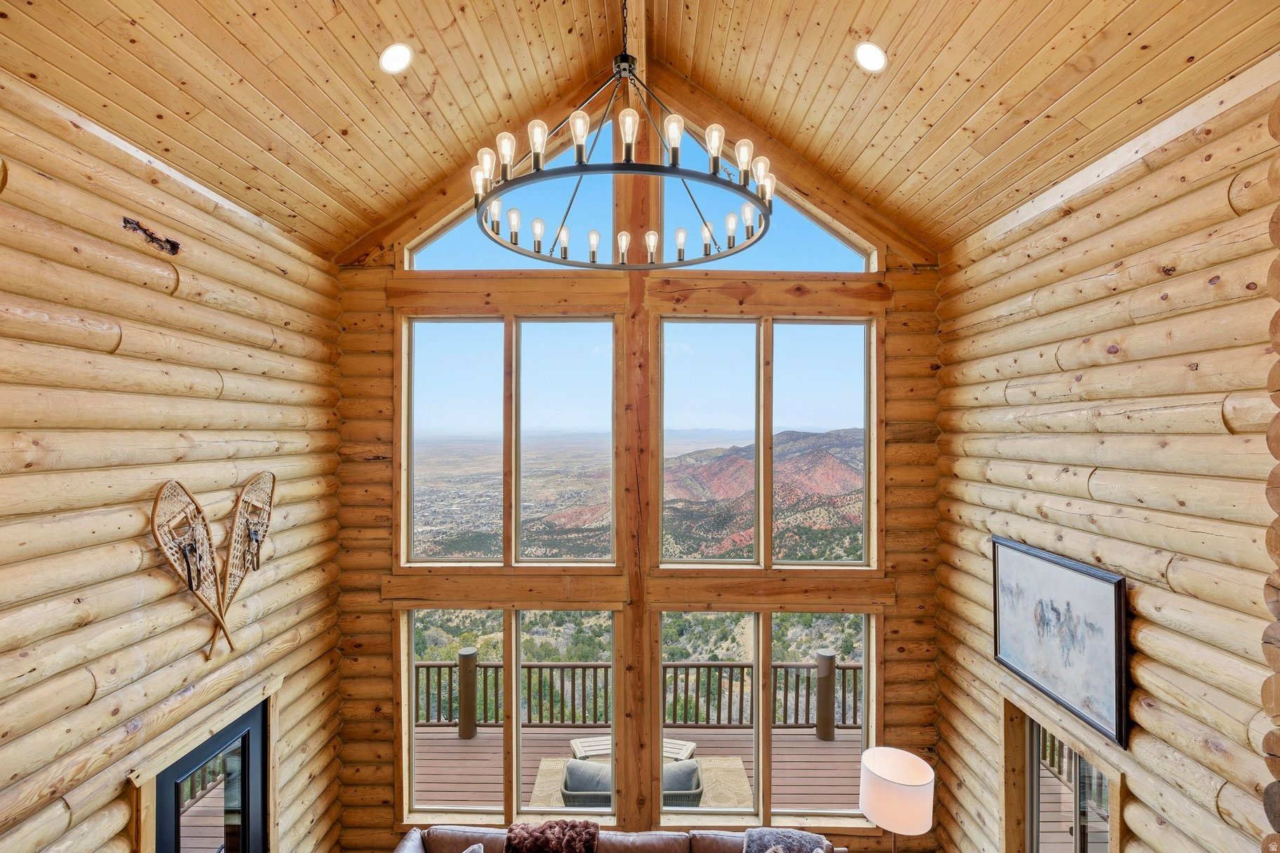 Experience the pinnacle of mountain living in this breathtakingly renovated log cabin, perched in the serene community of Cedar Highlands. This home has been meticulously updated to blend rustic charm with modern luxury, featuring a complete log restoration and professional exterior staining finished in late 2023. Inside, the home boasts unique light fixtures, and stunning walnut floors that add a layer of warmth and character to every room. The heart of the home includes a remodeled kitchen boasting brand-new appliances and elegant stone countertops. All bathrooms have been completely transformed with high-end finishes, and new custom interior handrails lead you through the thoughtful layout. This property is offered as a turnkey retreat, including all furniture, bedding, linens, and kitchen essentials, allowing you to move in and immediately begin enjoying the quiet elevation.  Beyond the interior, the home is designed to harmonize with its stunning natural surroundings. You'll find jaw-dropping views from every window. The outdoor living spaces are equally impressive, featuring a massive restored wraparound deck on the main level and private balconies with new French doors and Andersen storm doors for all upstairsbedrooms. These elevated spaces provide a front-row seat to the local wildlife, with deer regularly visiting the property. The exterior is rounded out with practical upgrades, including new window screens, a newly graded and smoothed driveway with a sturdy stone sidewall, and a freshly painted garage. Whether you are warming up by either of the 2 stone fireplaces or watching the sunrise over the peaks, this home offers a unique sense of stillness and serenity.  Located at an elevation of over 7,000 feet, Cedar Highlands offers a lifestyle defined by adventure and beauty.You are perfectly positioned for world-class recreation, with a short drive to the powder atBrian Head Ski Resortand easy access to the majestic landscapes ofZion, Bryce Canyon, and Cedar Breaks National Parks.The community itself features fantastic hiking and biking trails, while the vibrant culture of Cedar City is just down the mountain.Home toSouthern Utah Universityand the renownedUtah Shakespeare Festival, the city offers a diverse array of restaurants, golf courses, and reservoirs. Whether you are exploring the red rocks or enjoying a quiet evening in the mountain air, this property serves as the ultimate basecamp for the best of Southern Utah. All information herein is deemed reliable but is not guaranteed. Buyer is responsible to verify all listing information, including square feet/acreage, to the buyer's own satisfaction.