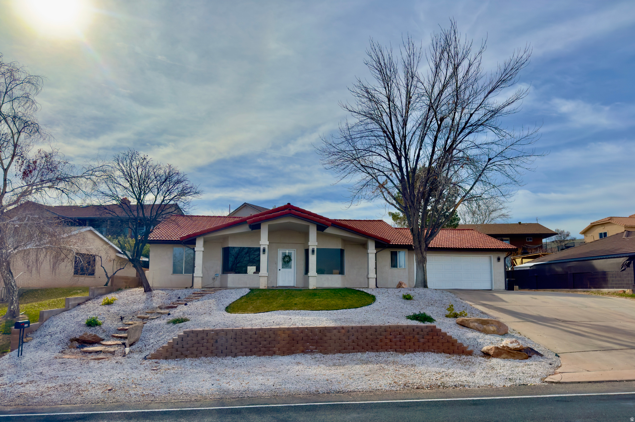 VIEWS, VIEWS, VIEWS! Beautifully remodeled home with stunning Pine Valley Mountain views and incredible city lights at night. Located in a highly sought-after neighborhood with no HOA. Features 3 bedrooms plus a hobby room and additional living space. Spacious kitchen with tall cabinets and ample storage. Large grassy backyard with covered patio-perfect for entertaining. Extra RV parking on the side. Deep garage with storage room and attic storage with pull-down ladder. Move-in ready and packed with value!