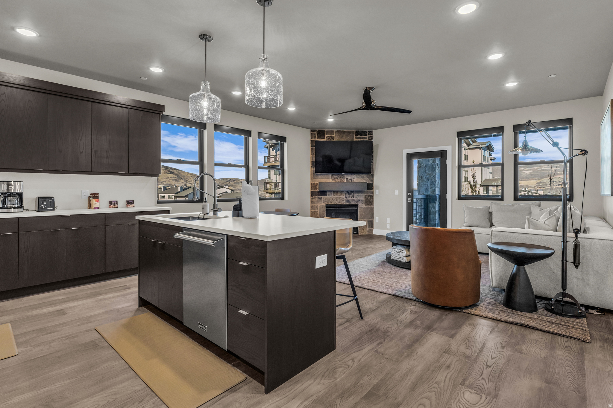Some mountain homes make you work for the experience. This one hands it to you. Imagine waking up, sliding open the balcony door, and watching the morning light spill across the Wasatch peaks with a cup of coffee in hand - before anyone else on your street has even stirred. That's the quiet magic of this 3-bed, 2-bath condo at Mayflower Lakeside, and it's available every single weekend you want it. This isn't a cramped ski box or a dated timeshare situation. This is 1,584 square feet of genuinely thoughtful design - 9-foot ceilings, wide-plank hardwood floors, and windows sized to actually show off the mountains outside. The gas fireplace isn't decorative; it's the thing you'll collapse in front of after a powder day or an afternoon on Jordanelle. The kitchen pulls its weight too: Viking appliances, quartz counters, and under-cabinet lighting that makes late-night aprs feel a little more civilized. The east-facing balcony off both the living room and primary suite is the real secret weapon - morning sun, mountain views, no west-facing glare baking you out by noon. The location might be the best part. Five minutes to Deer Valley's new East Village chairlifts. Five minutes to the reservoir. Fifteen minutes to Park City's Main Street. Under 40 minutes to SLC International - and not a single stoplight the whole way. You'll stop thinking of this as a "getaway" and start thinking of it as just... home base. Underground parking, elevator access, and a clubhouse on the way with a pool, year-round hot tub, and pickleball courts round out the amenities. It comes fully furnished and is nightly rental eligible - so when you're not here, it can work for you. Lock the door. Leave. Come back to exactly what you left. That's the deal.