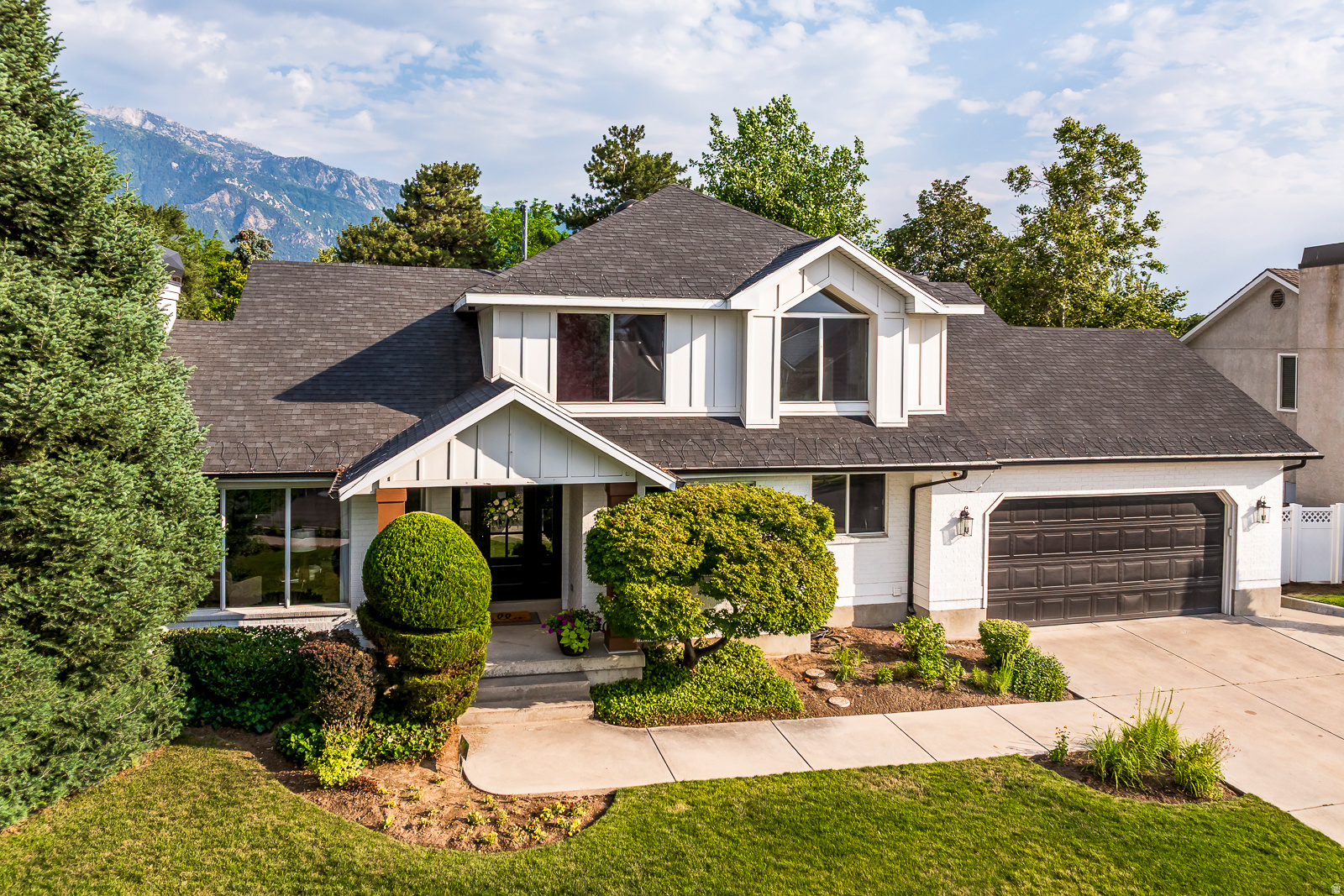 Beautiful and recently renovated home- located near the mouth of Little Cottonwood Canyon in Sandy. This home offers the perfect blend of comfort, style, and convenience- perfect for hosting or enjoying quiet time at home. The private backyard is designed for relaxing and entertaining- featuring a spacious deck with shade, a fire pit, and plenty of room to enjoy the shaded back patio. You'll enjoy the spacious living areas with a full wet bar and finished cold storage room in the basement. This home also features dual HVAC systems with 2 furnaces, 2 air conditioning units, and a separate downstairs thermostat- providing efficient climate control throughout the home. With quick access to world-class skiing, hiking, biking, shopping, and dining, this move-in-ready home is an excellent opportunity to enjoy everything the east side of Sandy has to offer.