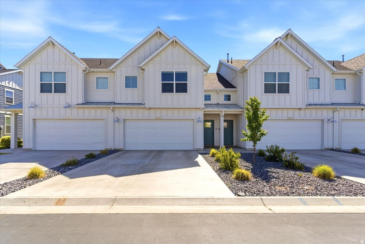 Like new, well kept townhome featuring 3 bedrooms, 2.5 bathrooms, and an attached 2-car garage. The main level offers an open-concept  layout connecting the kitchen, dining, and living areas. Big windows and great natural lighting. Th bedrooms and laundry are located on the upper level, including a Private Primary bedroom with large en suite and walk-in closet. Exterior features include craftsman finishes, cement board siding, and a large patio extending the full length of the townhome that opens to community green space. Community amenities include pickleball courts, playgrounds, walking trails, a dog park, and a fishing pond. You'll enjoy low maintenance and high-comfort living in West Haven's Green Farms Community.   Square footage figures are provided as a courtesy estimate only and were obtained from county records.  Buyer is advised to obtain an independent measurement.