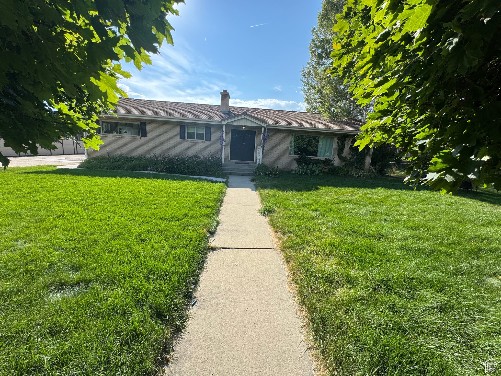 Charming 1963 Home in Prime Alpine Business District  Discover this beautifully remodeled 4-bedroom, 3-bathroom home located on Main Street in Alpine. Originally built in 1963, the property has been thoughtfully updated with a modern kitchen featuring new appliances, fresh paint throughout, new flooring, and plush new carpets.  Enjoy spacious living across three separate living areas, perfect for family gatherings or entertaining guests. The property provides exciting opportunities for commercial endeavors or other ventures.   The yard boasts mature trees and an automated sprinkler system, making maintenance effortless. Ample parking is available with plenty of space for guests or business needs. Partially fenced for privacy and security, this property combines classic charm with excellent potential in a highly desirable location.  Property being sold with parcel number 02:002:0085.
