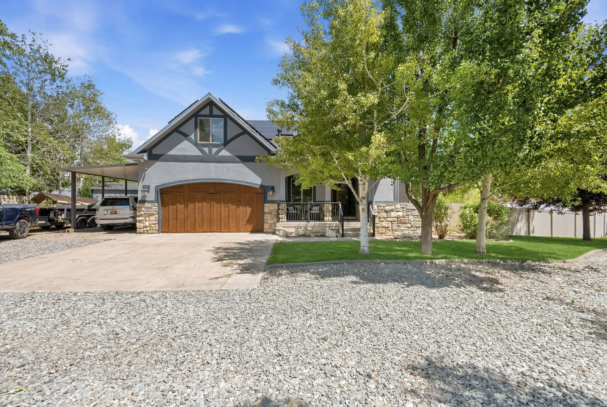 Tucked away on a private lane in one of Herriman's most desirable settings, this exceptional property offers the perfect blend of space, privacy, and versatility. Situated on a generous lot with abundant parking for vehicles, RVs, toys, and guests, this home was designed for both comfortable living and effortless entertaining.  Step inside to discover wide hallways, open gathering spaces, and a gourmet kitchen that serves as the heart of the home-featuring ample cabinetry, expansive countertops, and plenty of room for family and friends to gather. Large windows fill the home with natural light while showcasing the peaceful surroundings.  Outdoor living truly shines here, with multiple spaces to relax, entertain, garden, or simply enjoy the fresh mountain air. The spacious lot even offers room for backyard chickens, creating the opportunity for a charming hobby farm lifestyle while still enjoying all the conveniences of city living.  One of the property's standout features is the fully separate basement living space, offering incredible flexibility for multi-generational living, long-term rental income, or guest accommodations. With its own private living area and independent feel, this space creates an outstanding opportunity to offset your mortgage or generate additional income.  Rarely do homes offer this combination of privacy, functionality, income potential, and outdoor freedom. Whether you're looking for room to grow, space to play, or an investment-minded opportunity, this Herriman gem delivers it all