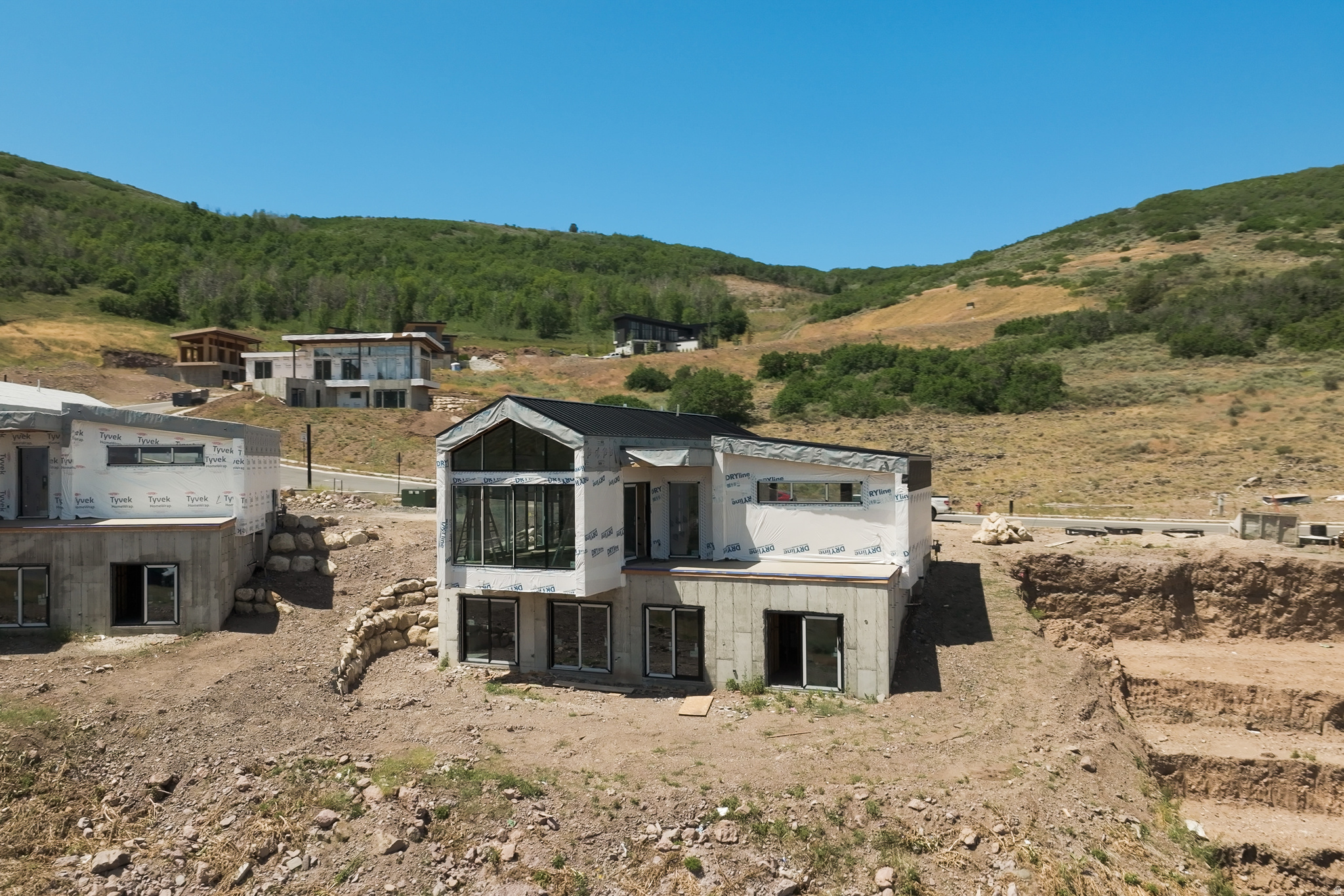 Experience elevated mountain living in the highly sought-after Heber City area. Situated on 0.4273 acres, this beautifully designed modern mountain home by Sage Homes offers the perfect blend of luxury, comfort, and investment potential with breathtaking panoramic mountain views in every direction.  Scheduled for completion in late 2026 to early 2027, this newly constructed residence provides the opportunity to secure a home in one of the Wasatch Back's fastest-growing luxury communities as values continue to rise.  Ideally located just moments from Jordanelle Reservoir, the Marcella Club(home to Tiger Woods' first mountain golf course design), the new Deer Valley East Village ski lifts, and Park City Mountain Resort, this home places Utah's premier recreation right at your doorstep. Whether your passion is skiing, boating, golf, hiking, biking, or simply taking in the scenery, this location delivers year-round adventure.  Thoughtfully designed for comfortable full-time living while also approved for short-term rentals, this property presents an exceptional opportunity for both homeowners and investors seeking strong rental appeal in one of Utah's most desirable resort destinations.  As one of the premier homes in the early stages of this community, buyers benefit from entering with an excellent opportunity for future appreciation as additional luxury homes are completed and future phases continue to build out.  Whether you're looking for a primary residence, a mountain getaway, or an income-producing investment, this modern mountain retreat offers the ideal combination of luxury, location, lifestyle, and long-term value. Don't miss your chance to own in one of Utah's most exciting new mountain communities, where panoramic views and world-class recreation are just outside your door.