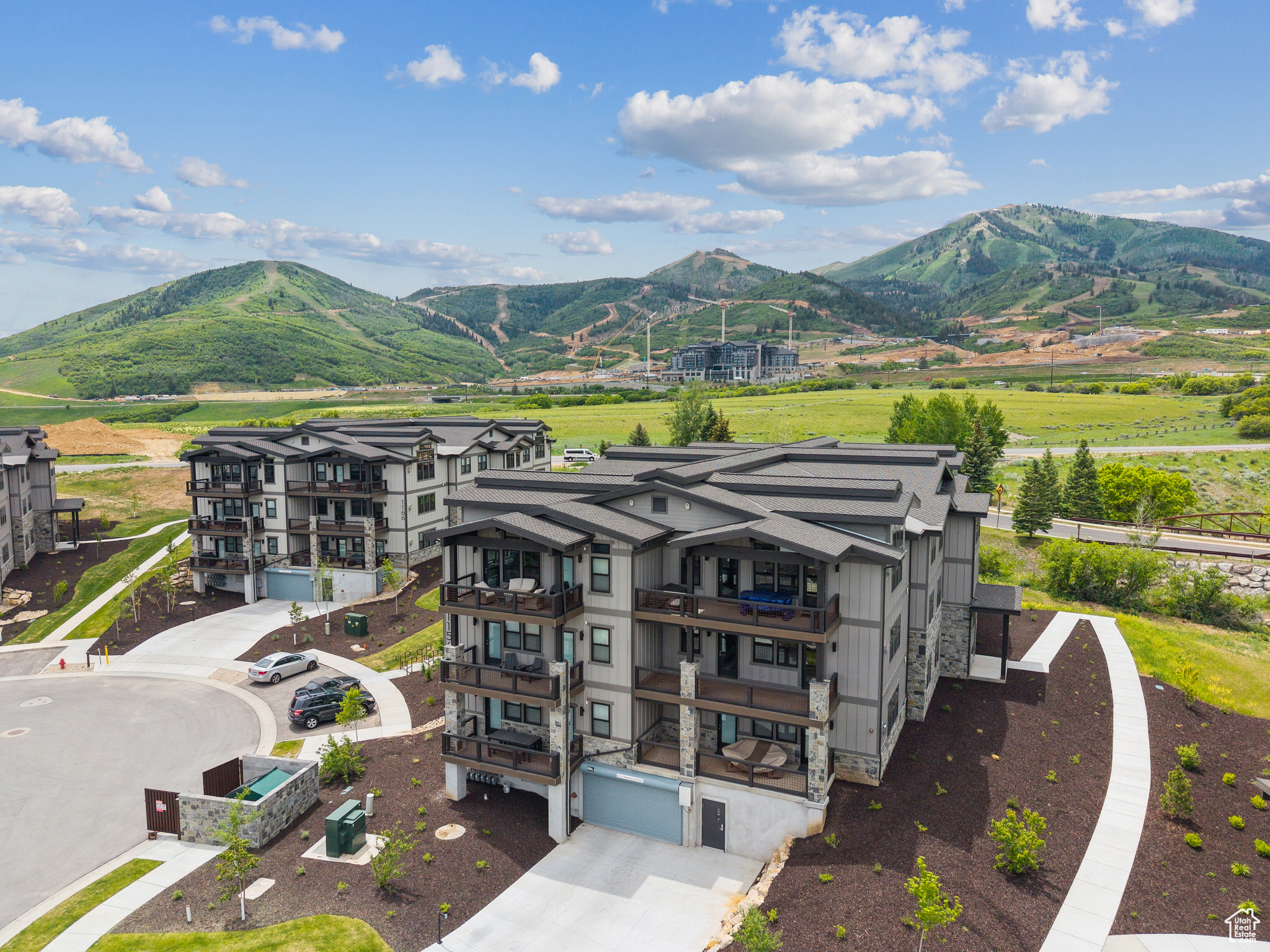 Beautiful 3 Bedroom Condo with Deer Valley Views. Discover Mayflower Lakeside-an incredible community with awe-inspiring views of the Jordanelle Reservoir and the majestic mountains of Deer Valley Resort. Summer and winter, your outdoor adventures are just outside your door: water sports, hiking & biking trails, and Deer Valley's first-class ski experiences. Mayflower Lakeside is just a stone's throw from Deer Valley's newest chairlifts at East Village; only a 15-minute drive to Park City's Historic Main Street; and less than 40 minutes to the SLC International Airport without a single stoplight. This beautifully appointed 3-bedroom, 2-bathroom, single-level condo is where sophistication meets comfort. The kitchen is a chef's dream, featuring sleek Quartz countertops, an elegant backsplash, under-cabinet lighting, and premium Viking appliances. The open-concept living area is anchored by a cozy gas fireplace with oversized windows to enjoy the views and unwind after a day of mountain exploration. Building amenities include an elevator, underground parking with storage cages. The soon-to-be-completed clubhouse will feature a seasonal pool, year-round hot tub, pickleball courts, and a play area. Nightly rentals are permitted. This residence has never been occupied and ready for your occupancy. Please come to the model at 1013 Eland Circle for tour/access.