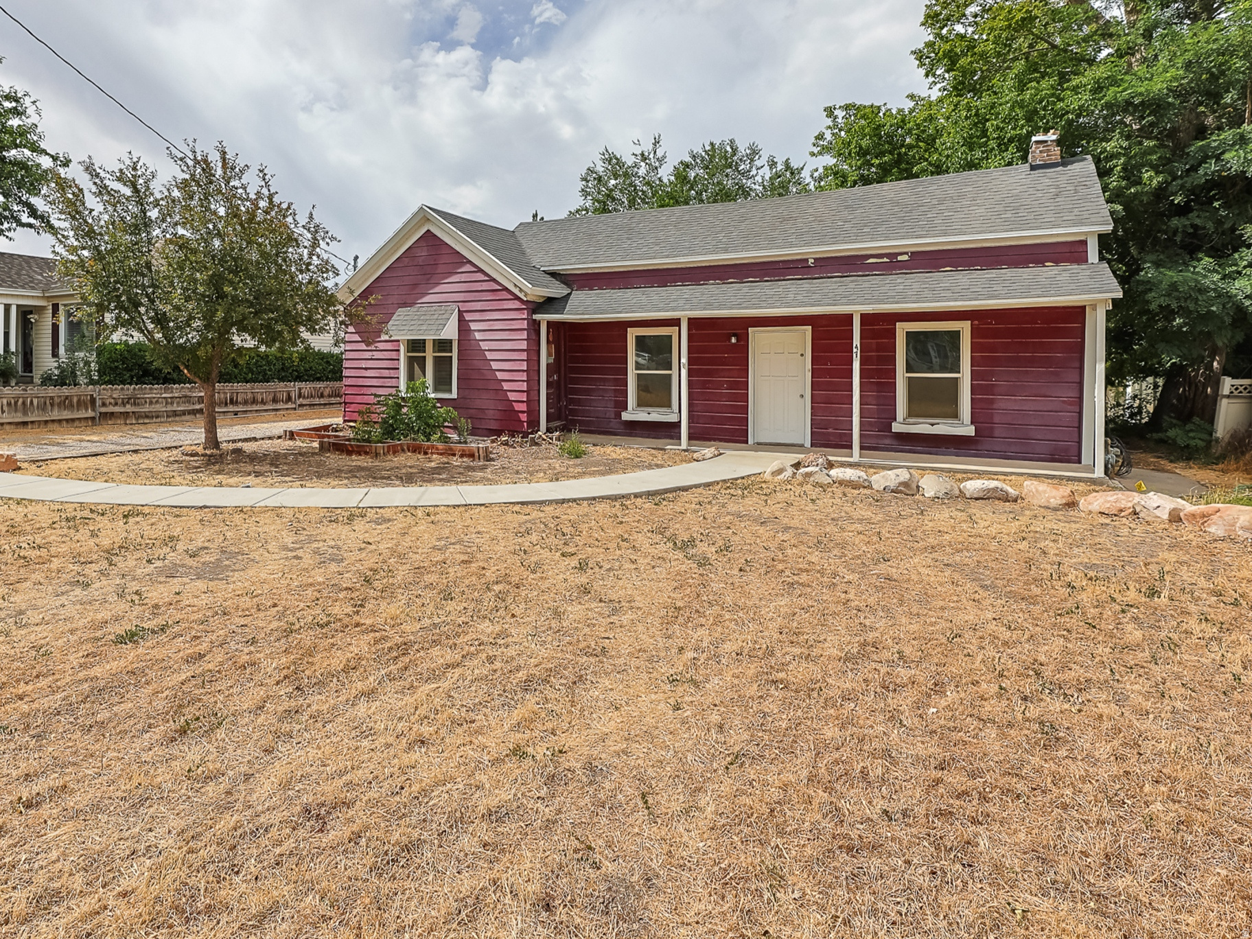 This charming 3-bedroom, 1-bath home offers comfort, and value.    Inside, you'll find a functional layout with comfortable living spaces and plenty of natural light. Whether you're a first time homebuyer, looking to downsize, or searching for an investment opportunity, this property offers a great combination of affordability and convenience. Recent updates for added peace of mind. Improvements in the past 8 years, include new shingles (2026), new fascia and soffit,  Furnace and A/C unit, flooring, partial windows, helping make this home move in ready.  Located on Main Street, you'll enjoy easy access to local schools, parks, shopping, and everyday amenities while experiencing the welcoming small town atmosphere that Grantsville is known for.