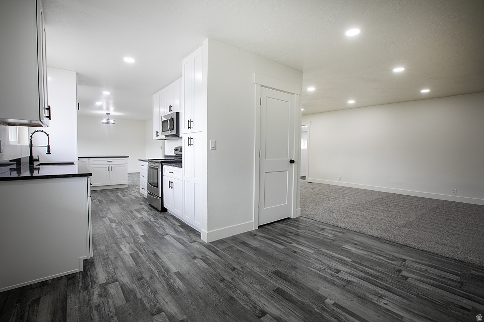 This fully remodeled 3 bed, 3 bath home has everything you've been looking for and more. From the moment you step inside, you'll notice the modern updates, fresh finishes, and move-in-ready feel throughout. Major upgrades include a brand-new roof and new A/C unit, giving you peace of mind for years to come. But the real showstoppers? This home features a heated indoor swimming pool, perfect for relaxing, entertaining, or enjoying year-round fun with family and friends. And if space is what you need, you'll love the massive 900 sq ft heated garage-ideal for multiple vehicles, ATVs, toys, a workshop, or the ultimate hobby Square footage figures are provided as a courtesy estimate only and were obtained from ___County Records.  Buyer is advised to obtain an independent measurement.