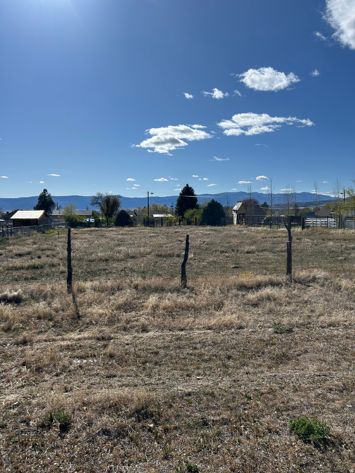 Beautiful 12 acre lot located in a desirable, well-established area. This property offers stunning views and the convenience of being close to schools, shopping, and the hospital-an ideal setting for comfortable everyday living. Irrigation water is available, providing added value and flexibility for landscaping or gardening. With its great location and attractive surroundings, this lot is the perfect place to build your dream home.