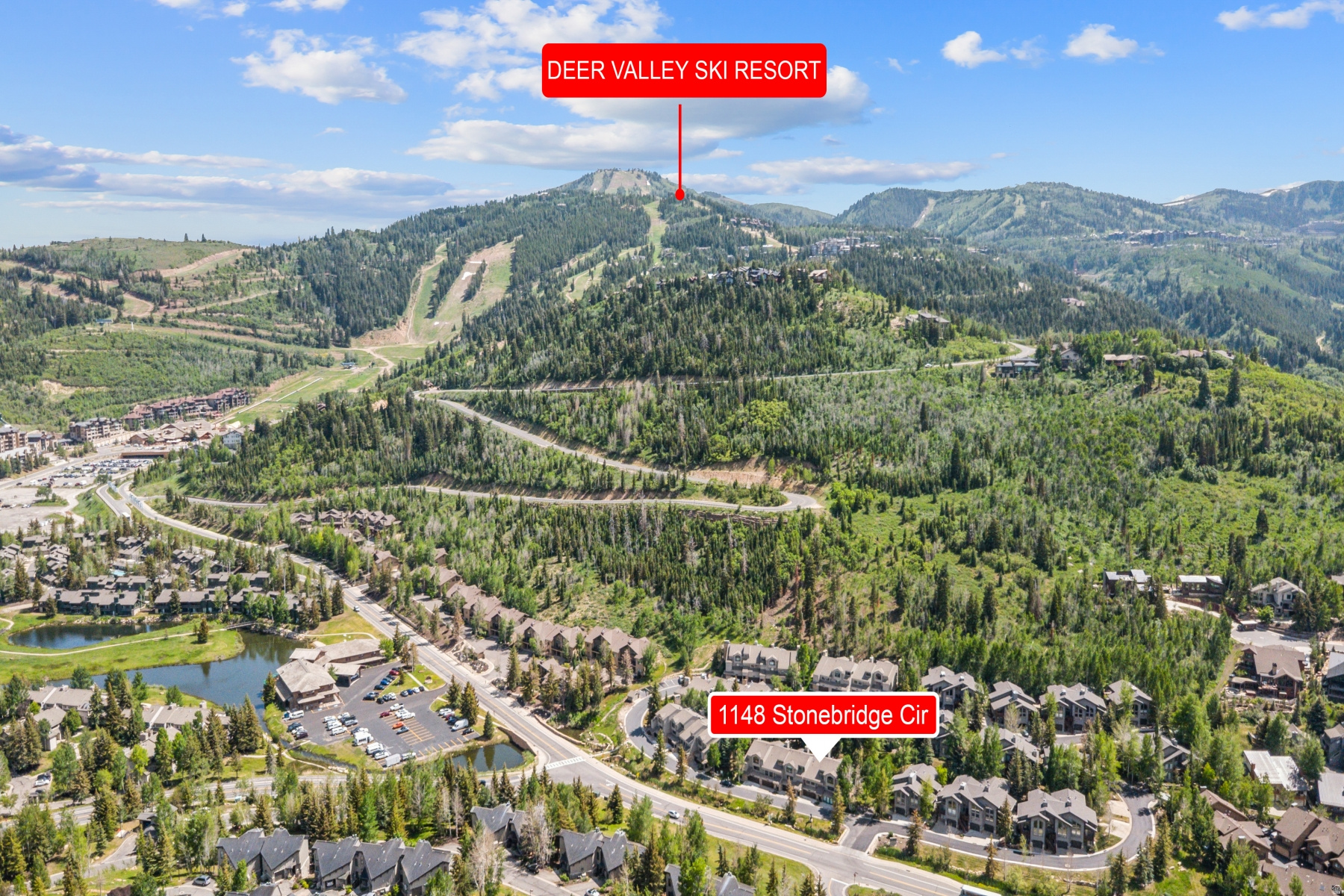 Tucked among the aspen trees in beautiful Deer Valley, this tastefully remodeled Stonebridge townhome offers the perfect year-round Park City retreat. Ideally located just a short walk from Old Town and the base of Snow Park Lodge, the home provides effortless access to skiing, dining, shopping, hiking, biking, and the free bus route. Inside, you'll find two spacious living areas, a beautifully updated kitchen, and a comfortable layout designed for mountain living. The home features two traditional bedrooms plus an office-style third bedroom, offering flexibility for guests, work, or additional sleeping space. The lower level includes a generous second living area with built-in bunk beds tucked off to the side, along with an adjacent windowless flex room ideal for a media room, office, workout space. After a day on the slopes or trails, unwind on the private deck in the luxurious hot tub surrounded by mature trees. Complete with a two-car garage, 1148 Stonebridge combines comfort, convenience, and timeless mountain charm in one of Park City's most desirable settings.