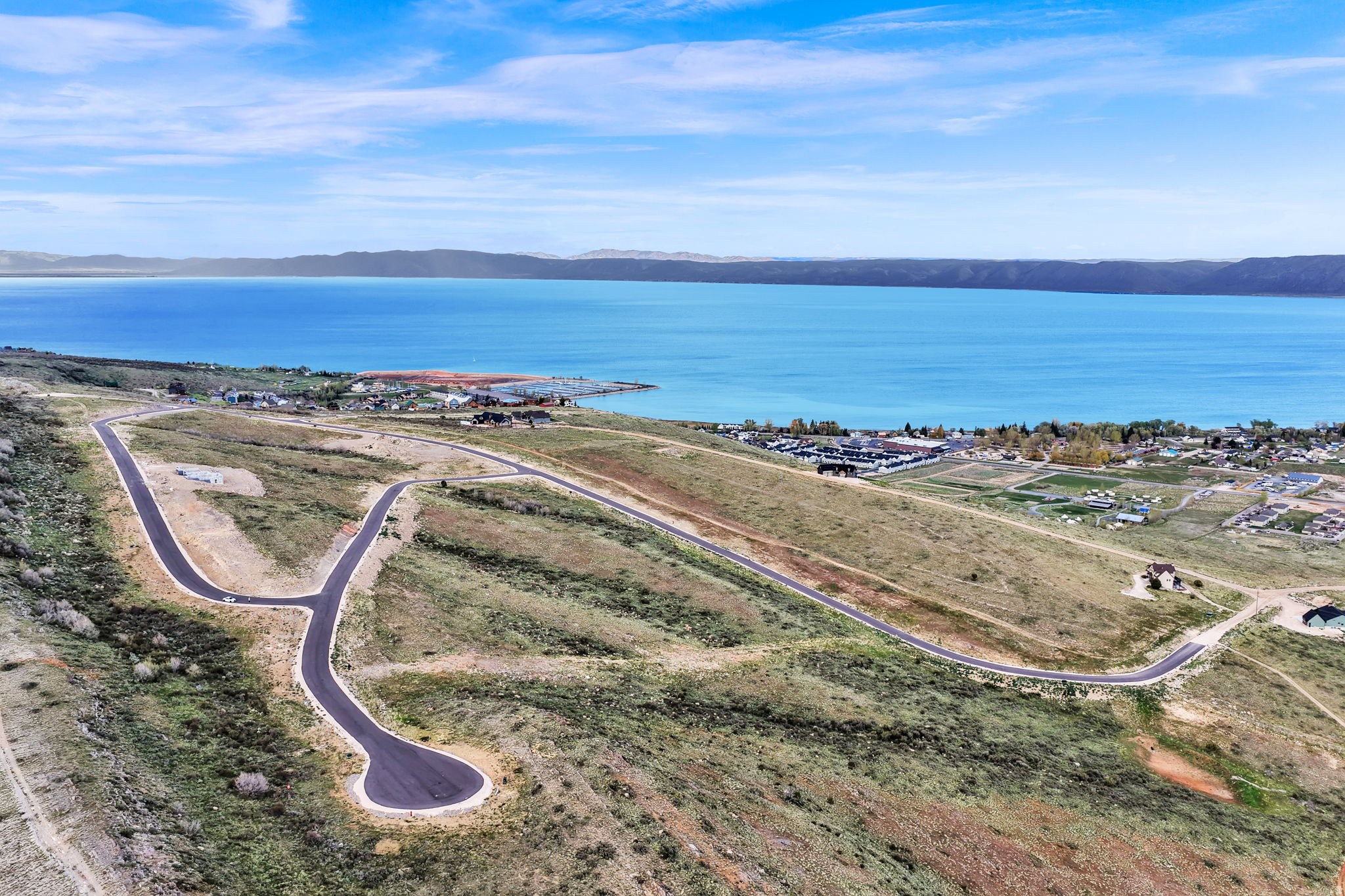 Wake up to the kind of Bear Lake views you normally only see on postcards. This stunning lot is perfectly positioned to capture sweeping panoramas of the lake, surrounding mountains, and big open skies-an ideal setting for a dream cabin, vacation getaway, or year-round home. Enjoy the best of Bear Lake living with easy access to the water, beaches, boating, and endless outdoor recreation, plus nearby dining, shopping, and year-round adventures. Whether you're looking for peace and privacy, or a home base for weekends packed with fun, this lot delivers the location, scenery, and lifestyle you've been searching for. Don't forget to check out my other available lots also listed near Bear Lake -more incredible land opportunities waiting for you! http://www.lakeviewbearlake.com/   WATER CONNECTION FEE HAS BEEN PREPAID!