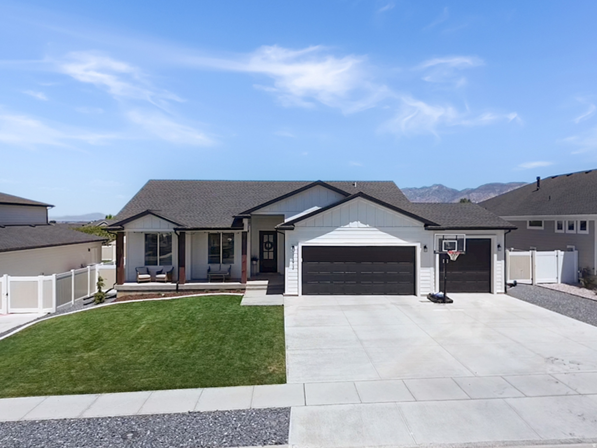 Welcome to this beautiful, custom-built rambler located in Perry Landing. Built in 2025, this home offers 3 bedrooms, 2 bathrooms, a tankless water heater and high-quality finishes throughout. Enjoy the convenience of a 3-car garage, RV parking, and a fully finished yard already in place. Relax and take in the breathtaking mountain views from your own backyard, where you'll currently enjoy the privacy of having no backyard neighbors. Every detail of this home reflects quality craftsmanship and modern design, making it truly move-in ready. Schedule a showing today.