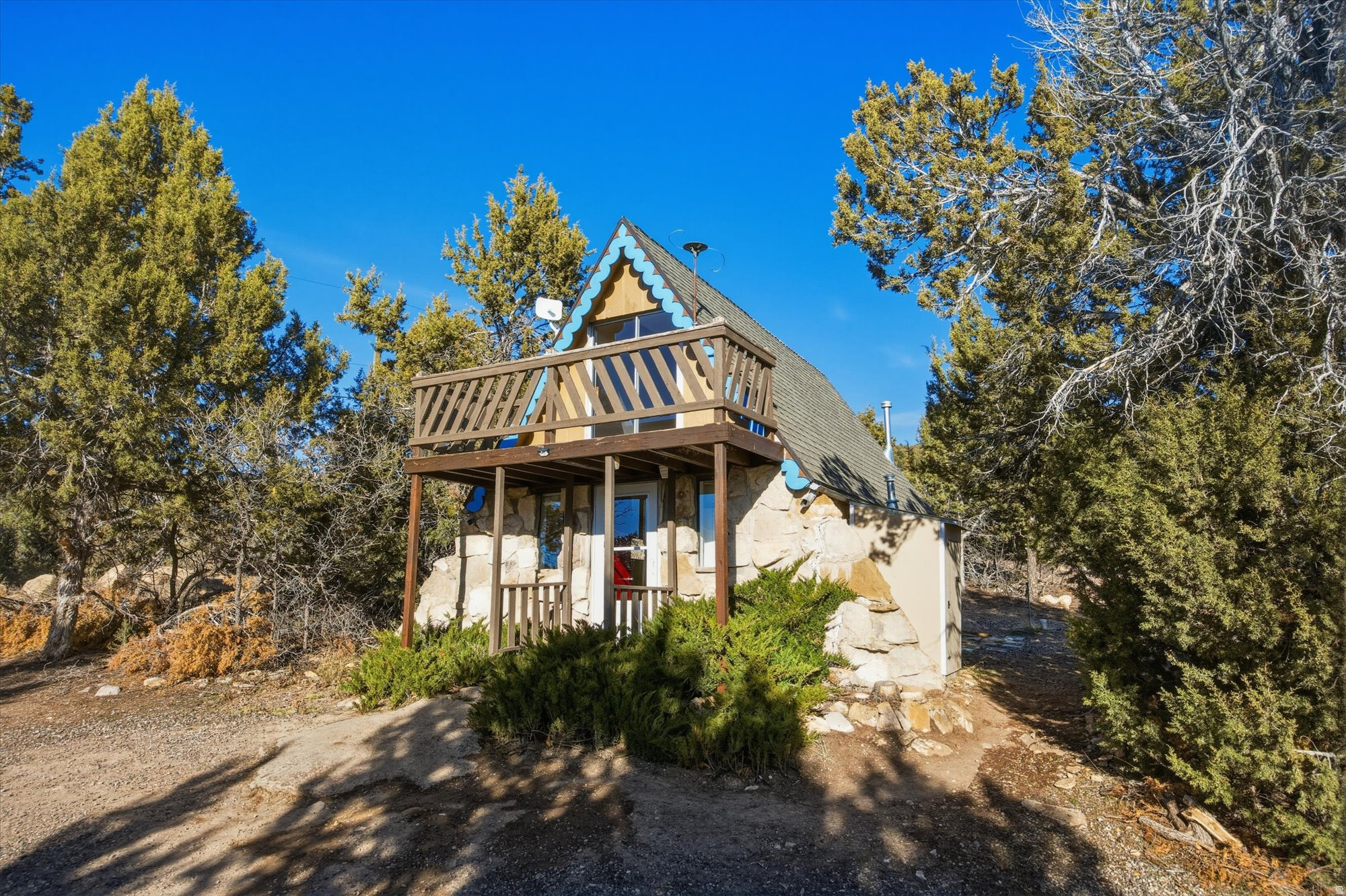 Tucked into the serene mountain landscape of Skyline Mountain Resort, this charming, recently remodeled A-Frame cabin offers the perfect blend of simplicity, privacy, and year round adventure.  Set on 1.02 acres in a sought after gated community, this property captures the essence of peaceful mountain living, while still providing reliable , all-season access.   With RV hook ups on sight, your loved ones can gather around the fire pit under star filled skies and enjoy sunrises at your own private retreat.  With over an acre of land, there is space to expand, garden, or simply enjoy a quiet life.  Skyline Mountain resort is located at the foot of the Manti-LaSal mountains and Skyline Drive, just minutes from Fairview and Mt Pleasant with grocery stores, restaurants, a hospital, aquatics center, drive-in theater, and every type of recreation you can think of (fishing, hiking, biking, ATV/Arapeen Trail, snowmobiling, mountaineering/Maple Canyon, etc.) NOTE: Rentals are not allowed in Skyline Mountain Resort.
