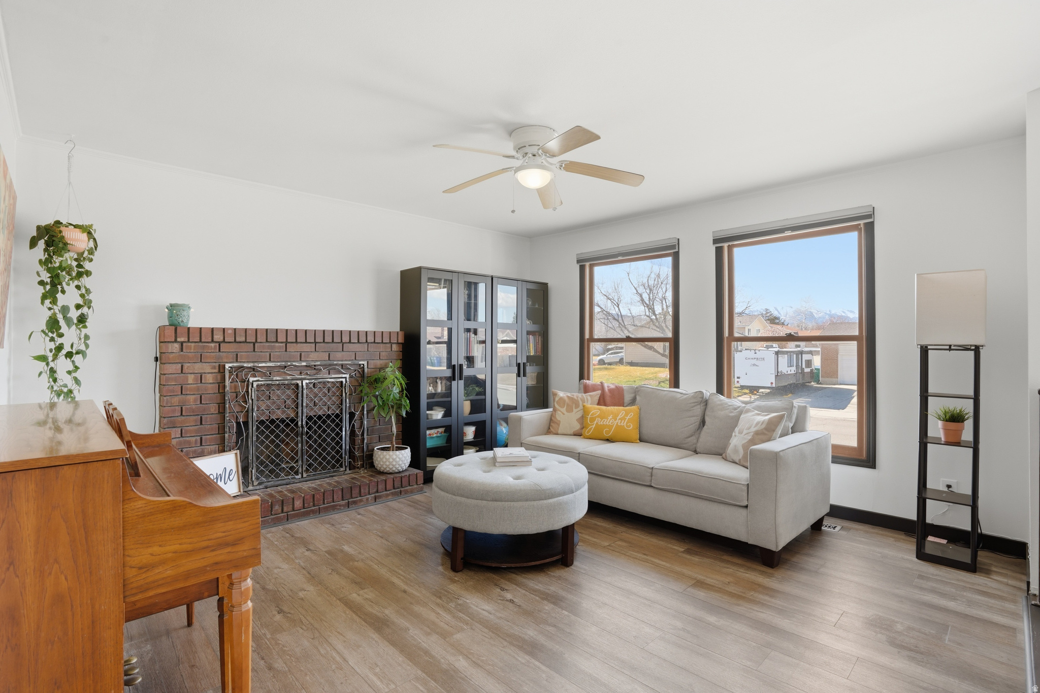 Open House: Sat 5/30 2-4pm. FHA ASSUMABLE LOAN AT 3.25%. Call agent for details. Buyer's financing fell through, back on the market! Updated Riverton home with bonus backyard space for garden (already planted), sheds, toys, RV and extra vehicles. Owners have created a Garden of Eden that is flourishing: 60 herbs, grapevines, flowers and trees of many varieties. Gazebo plus huge deck. Inside: 3 bedrooms on main w/ 2 living rooms and kitchen, eat in dining and entry to large back deck; (split entry home) downstairs: 2 beds & 1 office/den/game room in basement. All new carpet in basement. Newer laminate on main floor. New paint all throughout the home. New quartz countertops in the kitchen. Home is bright with shades that pull up or down, so you can keep privacy and still get sunlight. This home offers an additional second large living room in the back of main floor. Bonuses: Wood burning fireplace, garage attached shelves & cabinets, 2 large sheds. Room for toys, trampoline, volleyball, gardening and BBQ.   Square footage figures are provided as a courtesy estimate only and were obtained from a prior appraisal measurement. Buyer is advised to obtain an independent measurement.